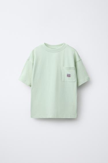 تيشرت بجيب وبطاقة - أخضر فاتح الخاص بـ Zara