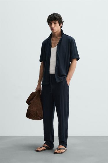 CALÇA COM TEXTURA LISTRADA - Azul-marinho da Zara - Imagem 0
