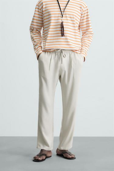 RELAXED FIT FLOWY TROUSERS - Ice by Zara