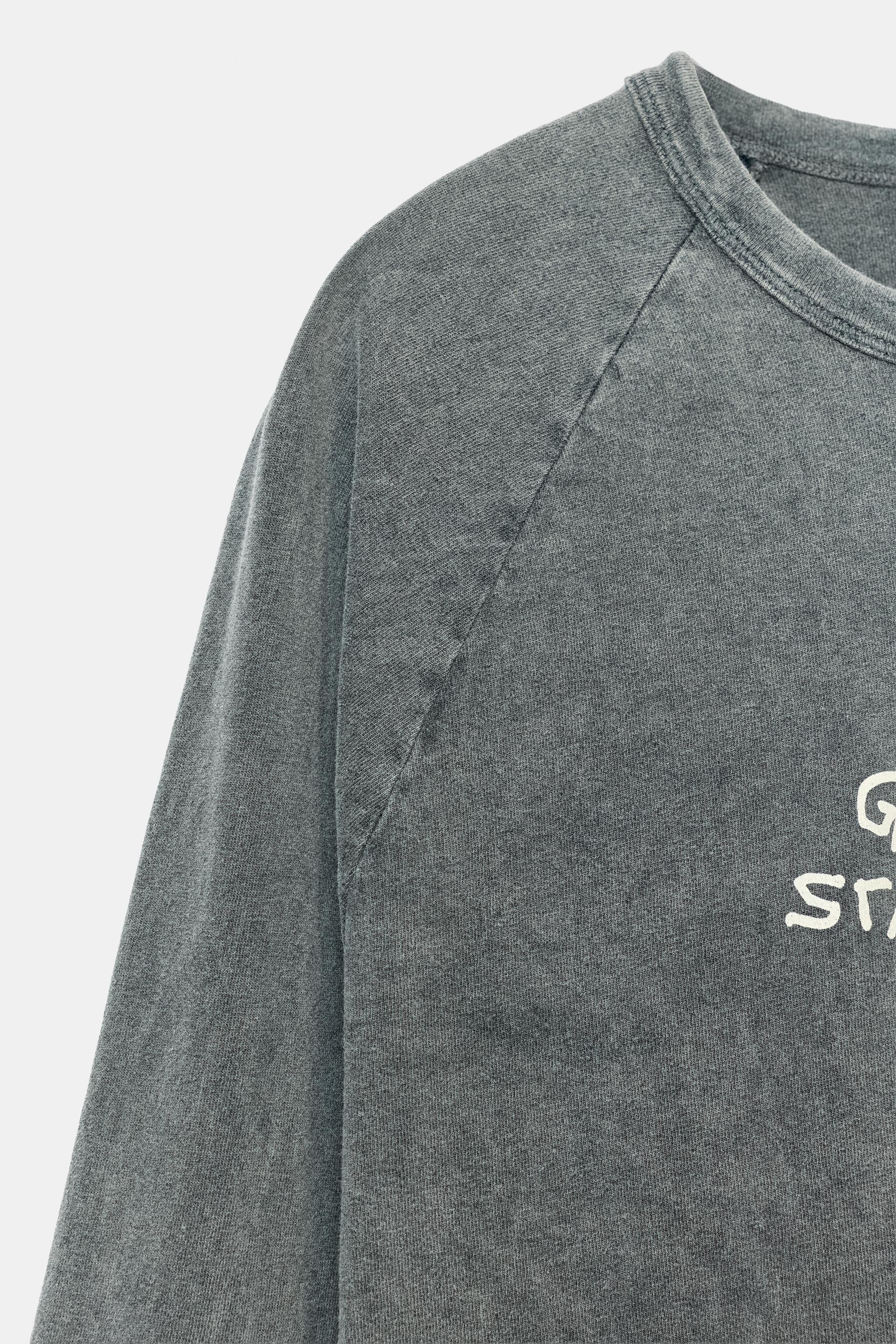 T-SHIRT À EFFET DÉLAVÉ ET DESSINS