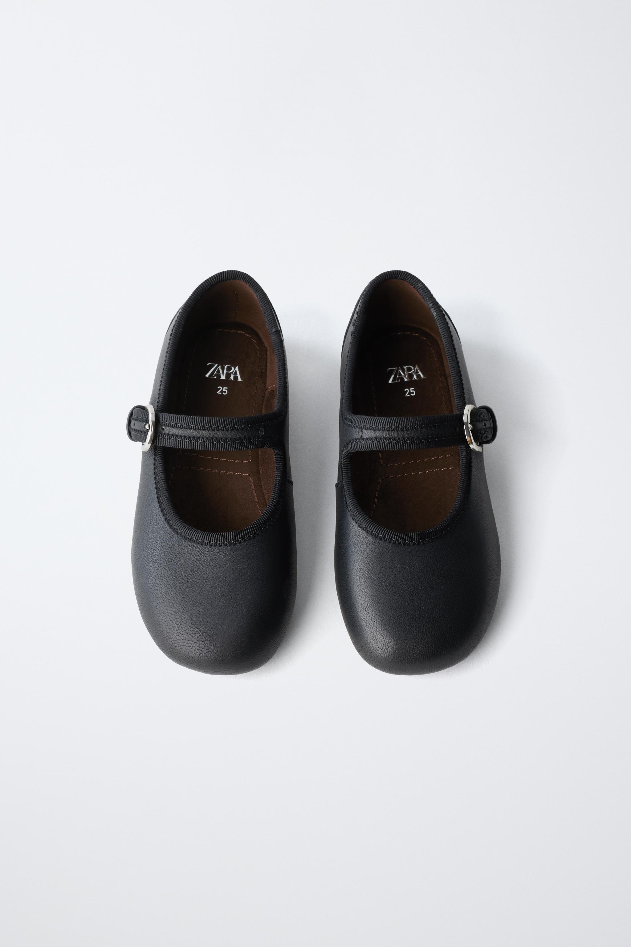 BALLERINES EN CUIR À BOUCLE