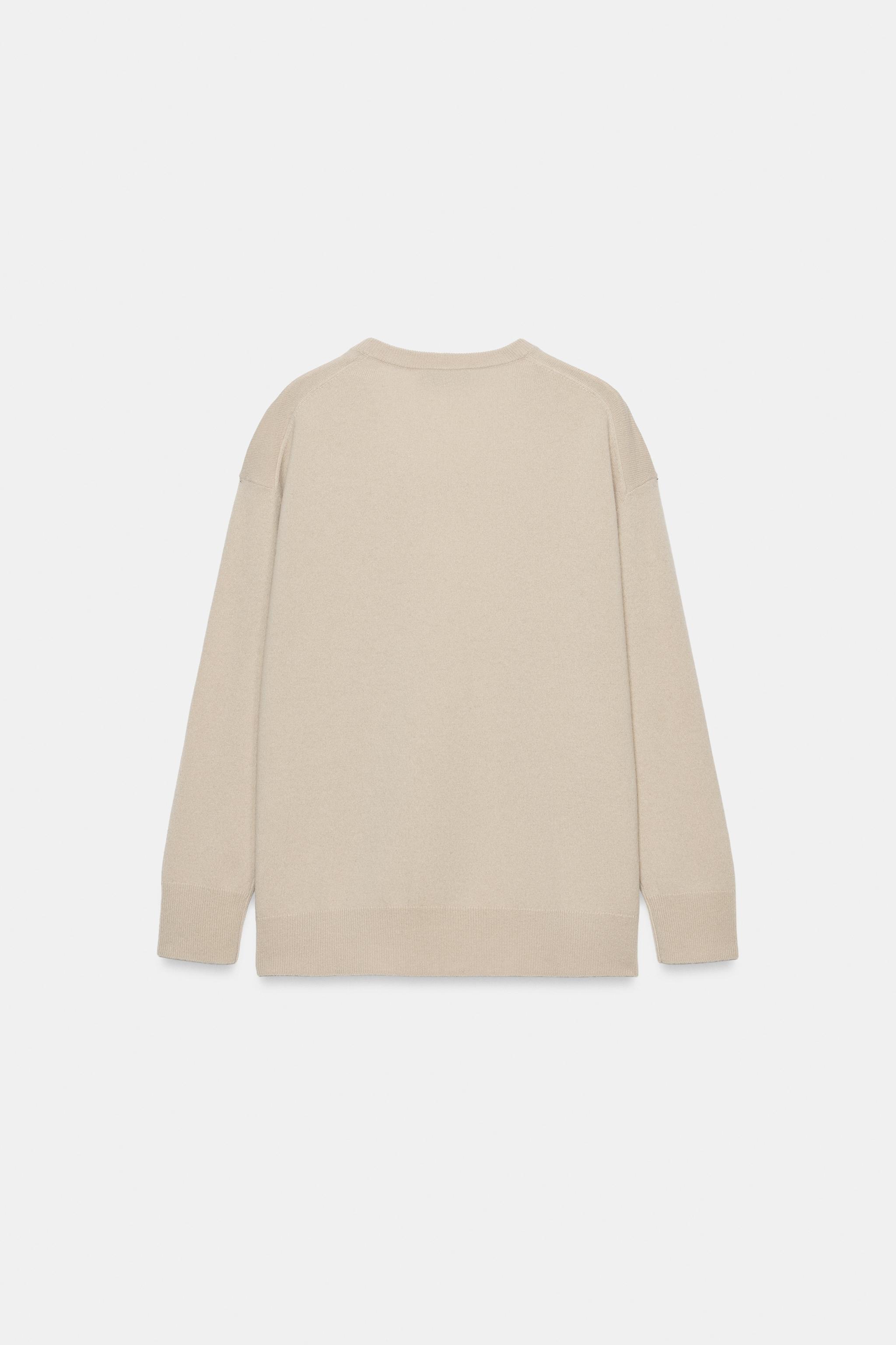 PULL OVERSIZE 100 % LAINE COL EN V
