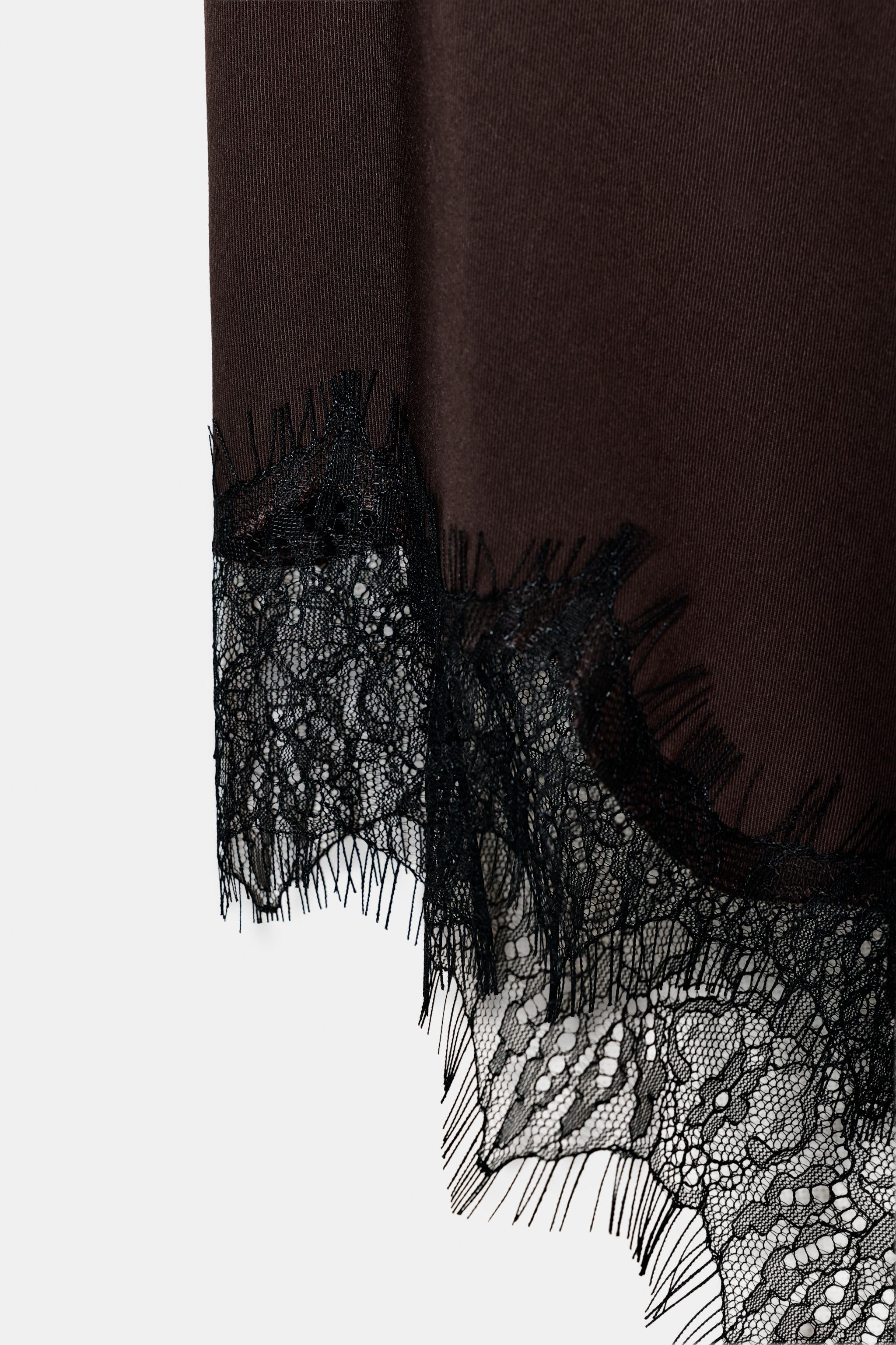ASYMMETRIC LACE TOP