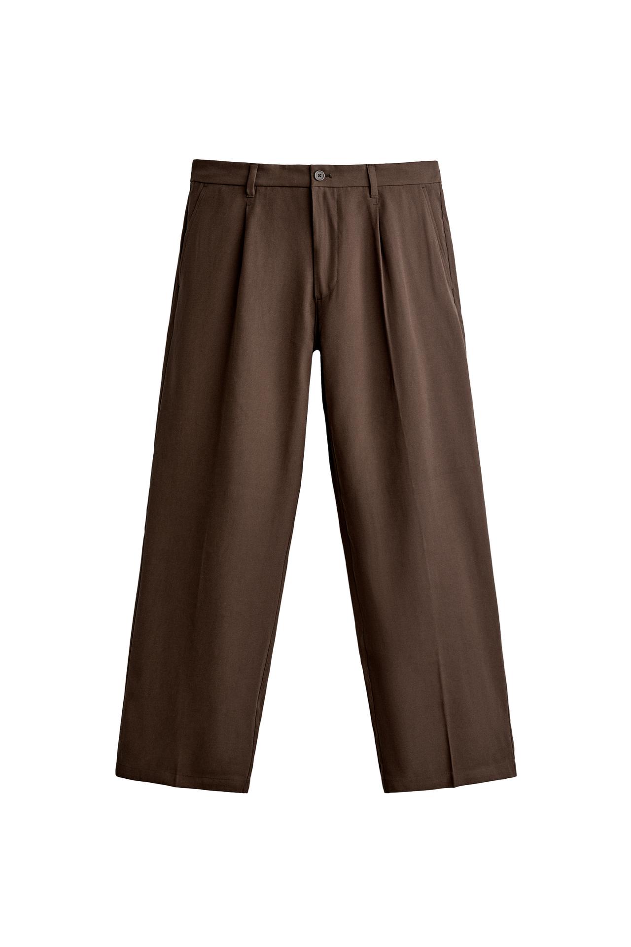 Брюки свободного кроя со складками из струящейся ткани