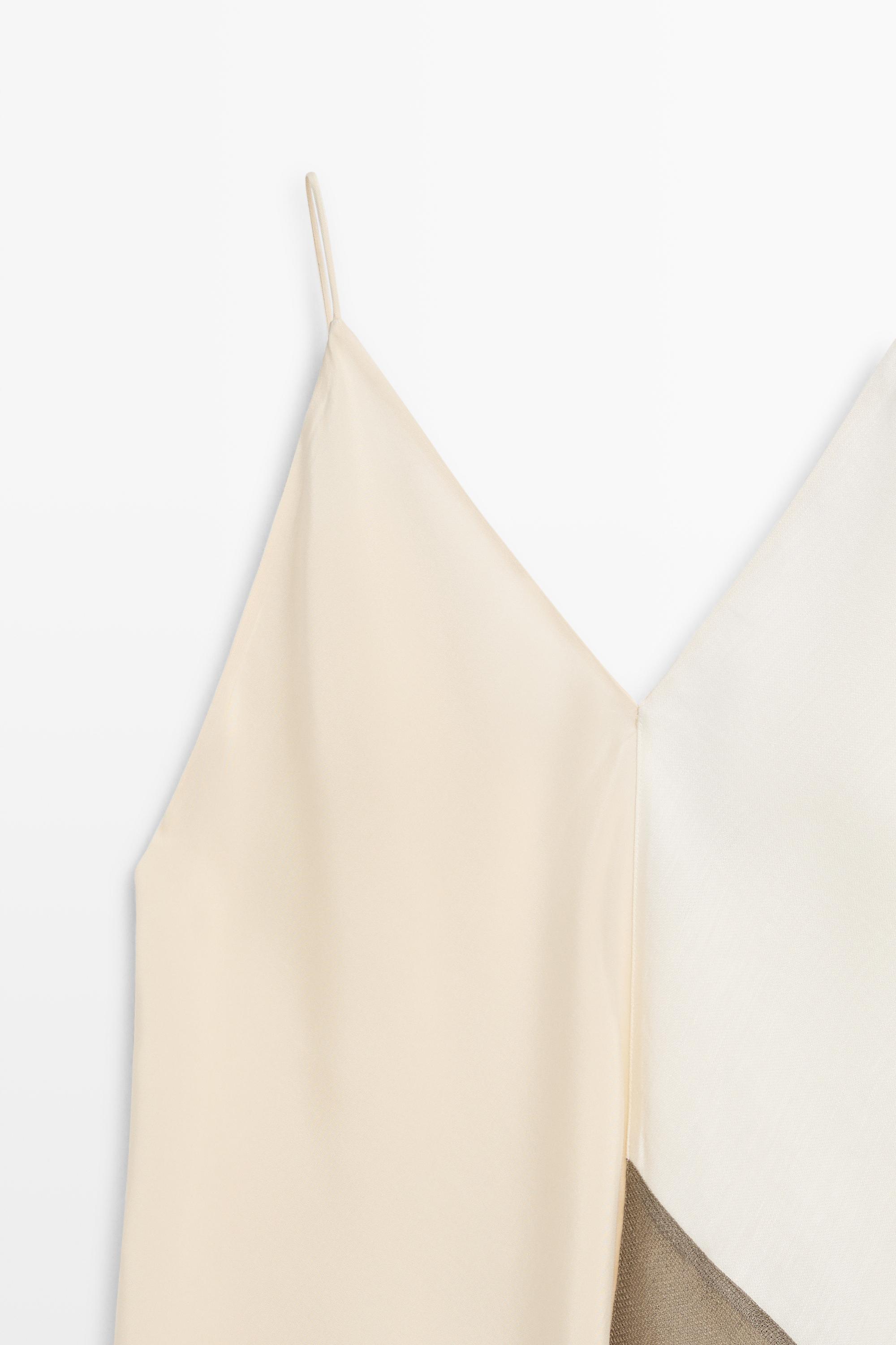 Asymmetric strappy flowing top — Ecru