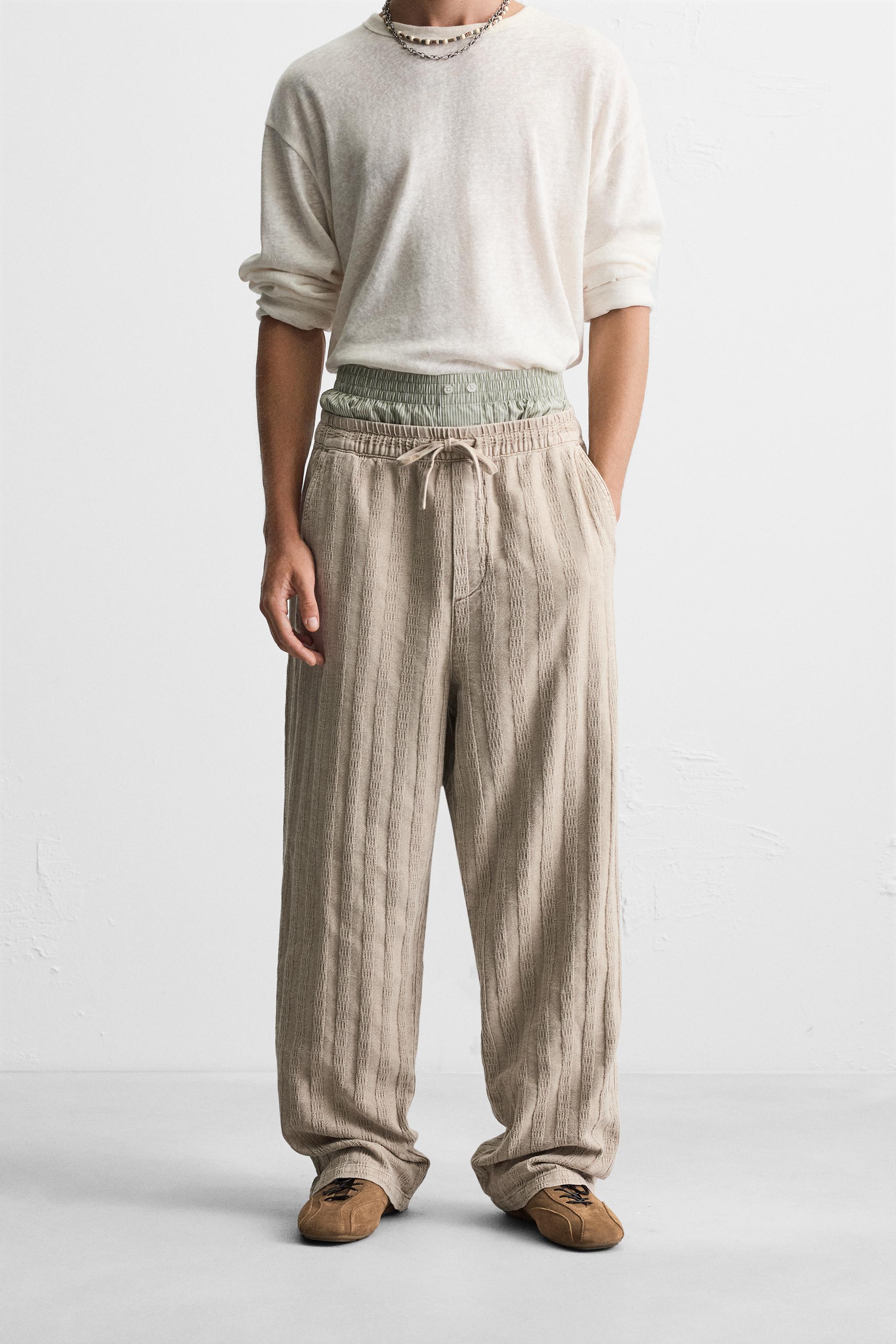 ZARA ザラ ウォッシュド加工プリントバギーフィットジーンズ EU44 ZARA ザラ ウォッシュド加工プリントバギーフィットジーンズ