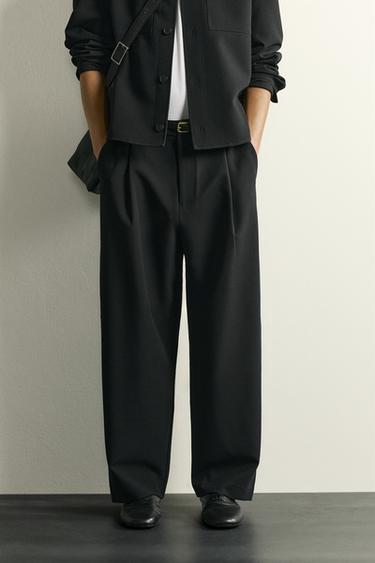 RELAXED FIT PLEATED TROUSERS - Black by Zara