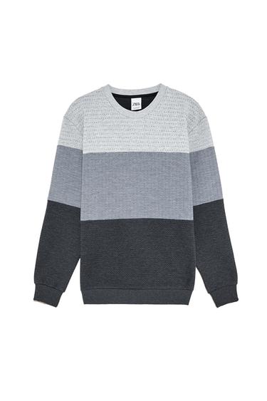 Quilted colorblock sweatshirt.