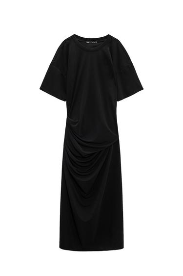 VESTIDO BAJO ASIMÉTRICO