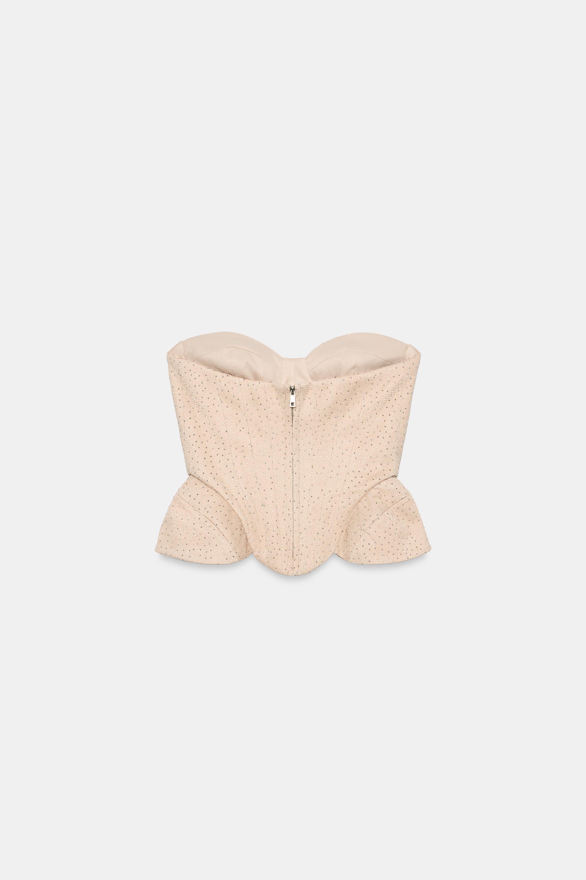 TOP CORSET À PEPLUM ET BRILLANTS