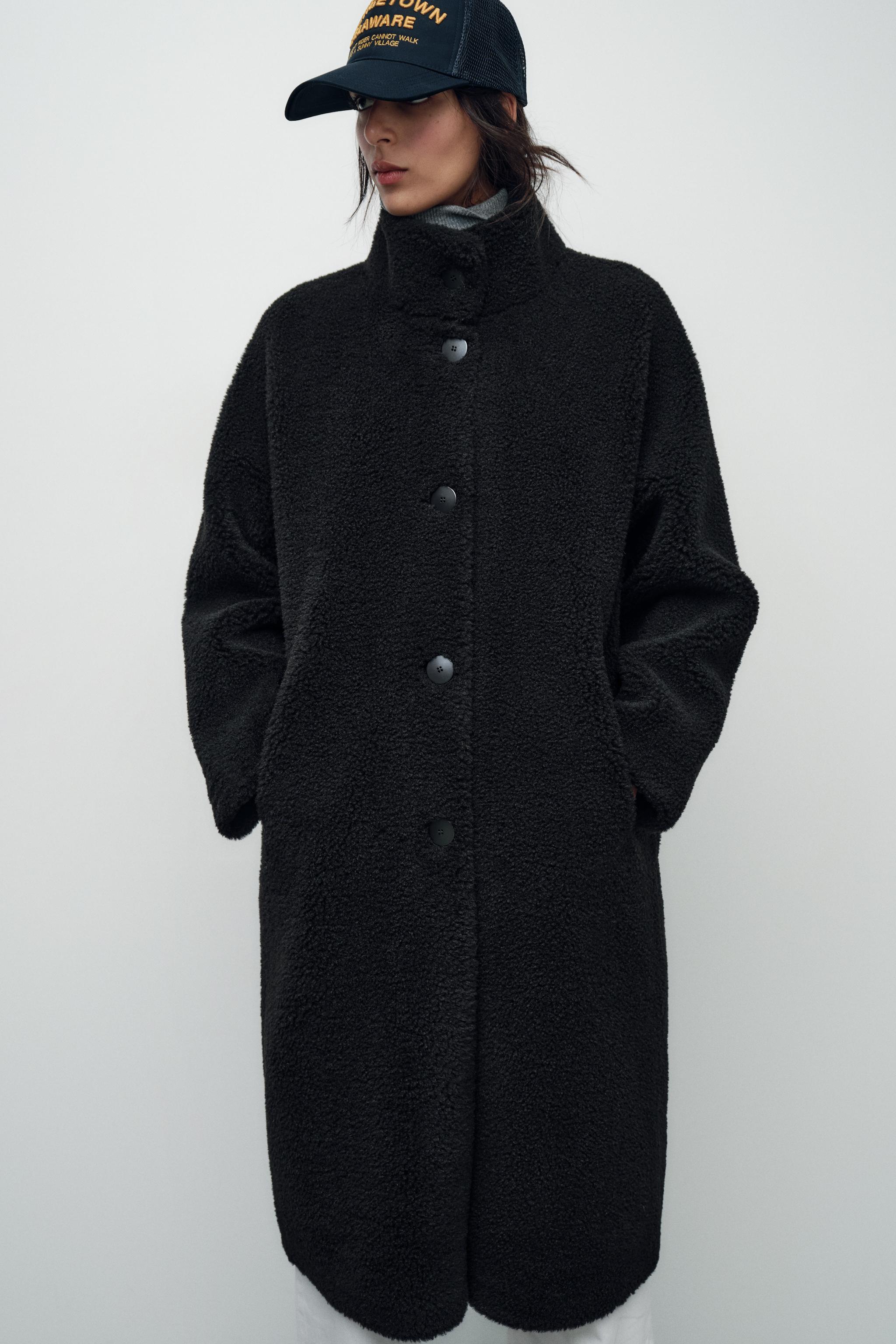 Manteau effet mouton noir sale