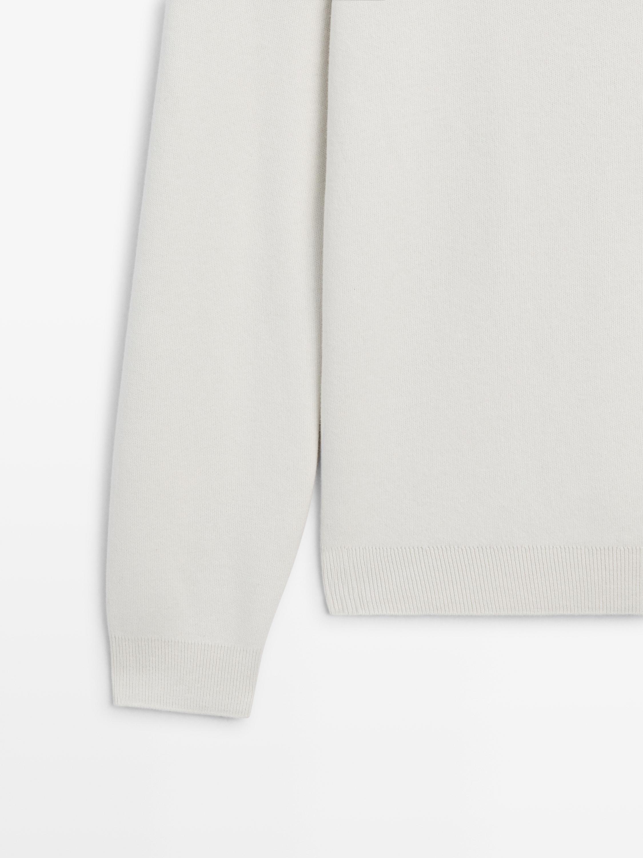 Knit 100% cotton quarter-zip sweater