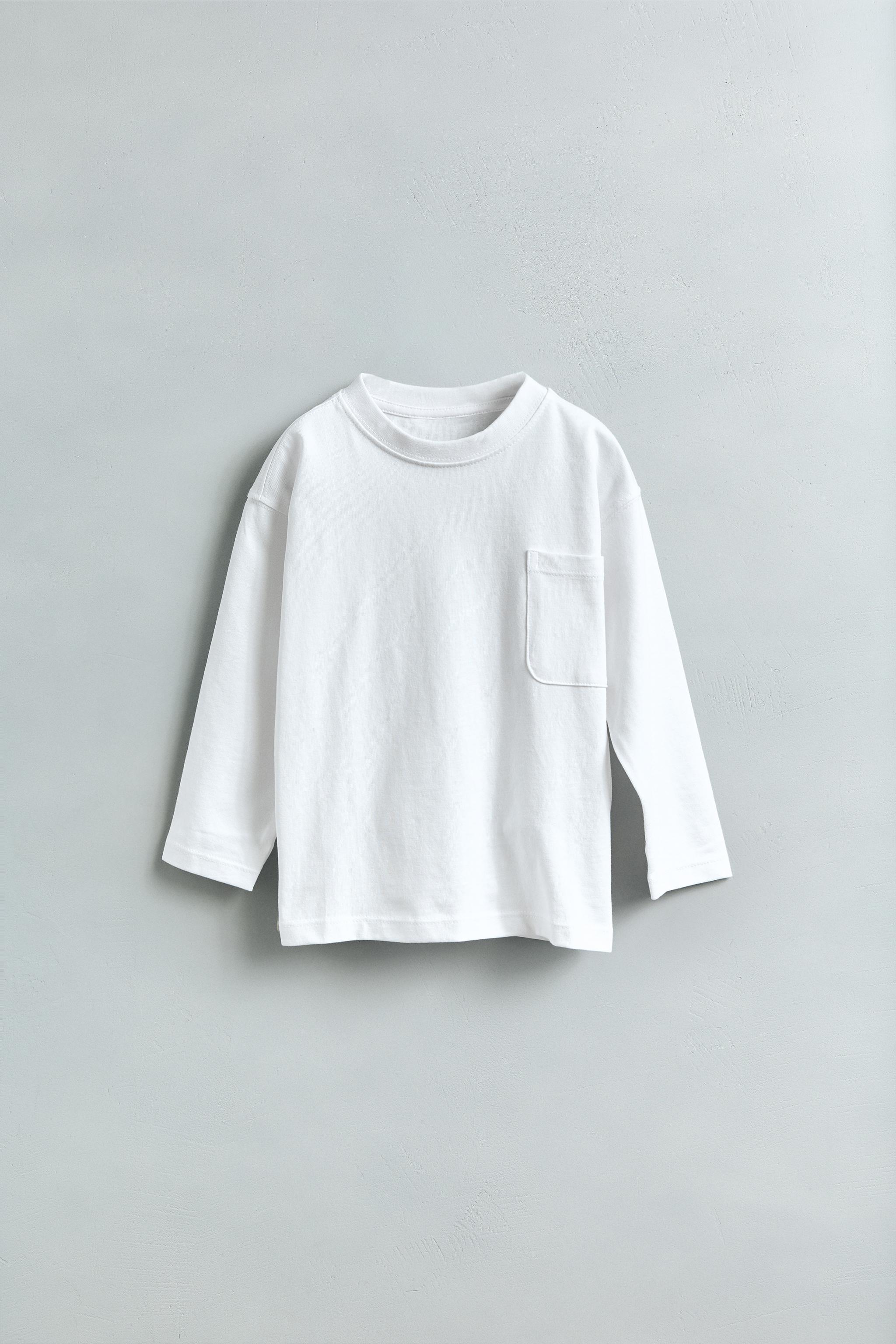 T-SHIRT UNI À POCHE