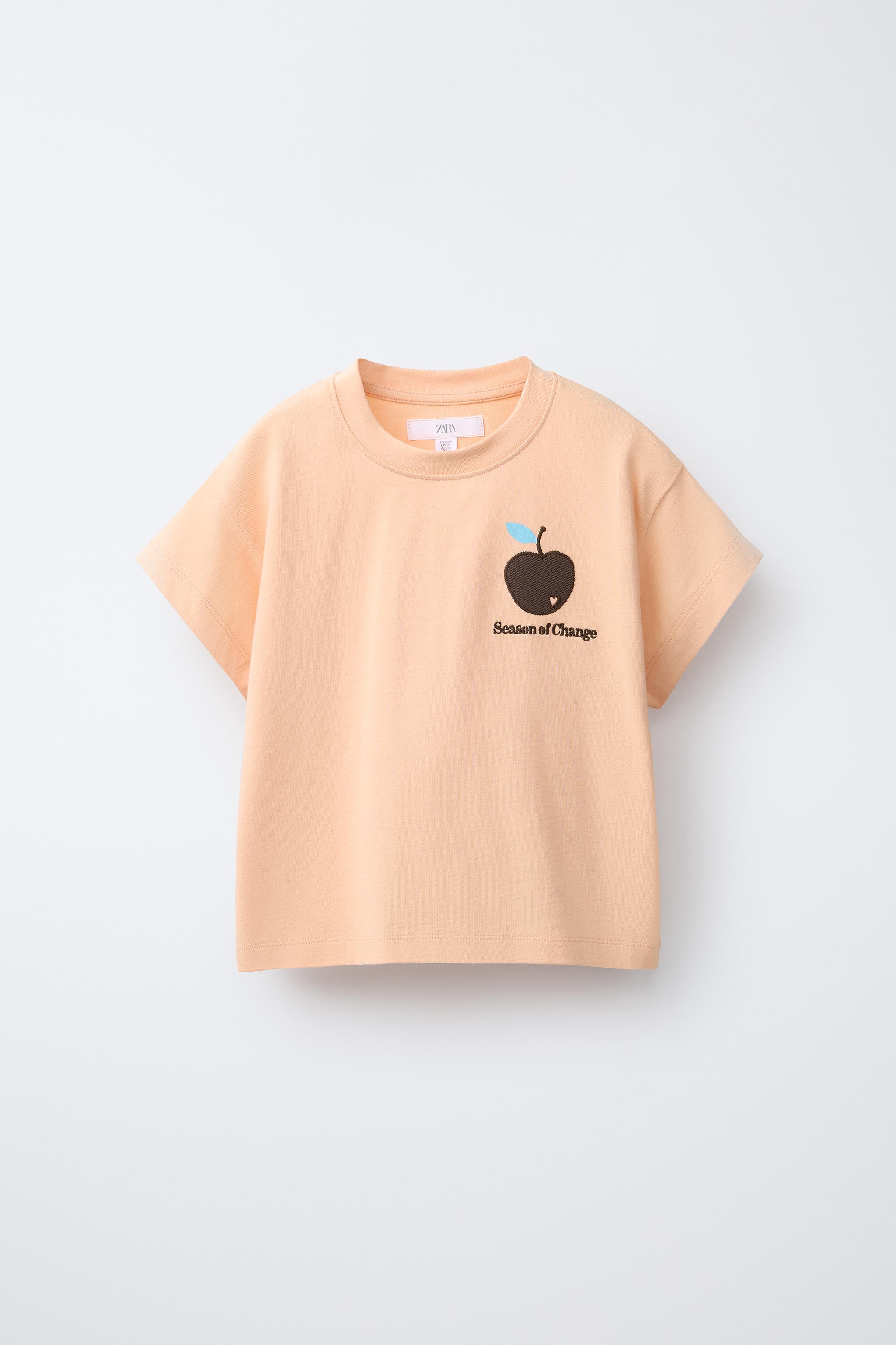 T-shirt con nodo fantasia etnica T-shirt con nodo fantasia etnica
