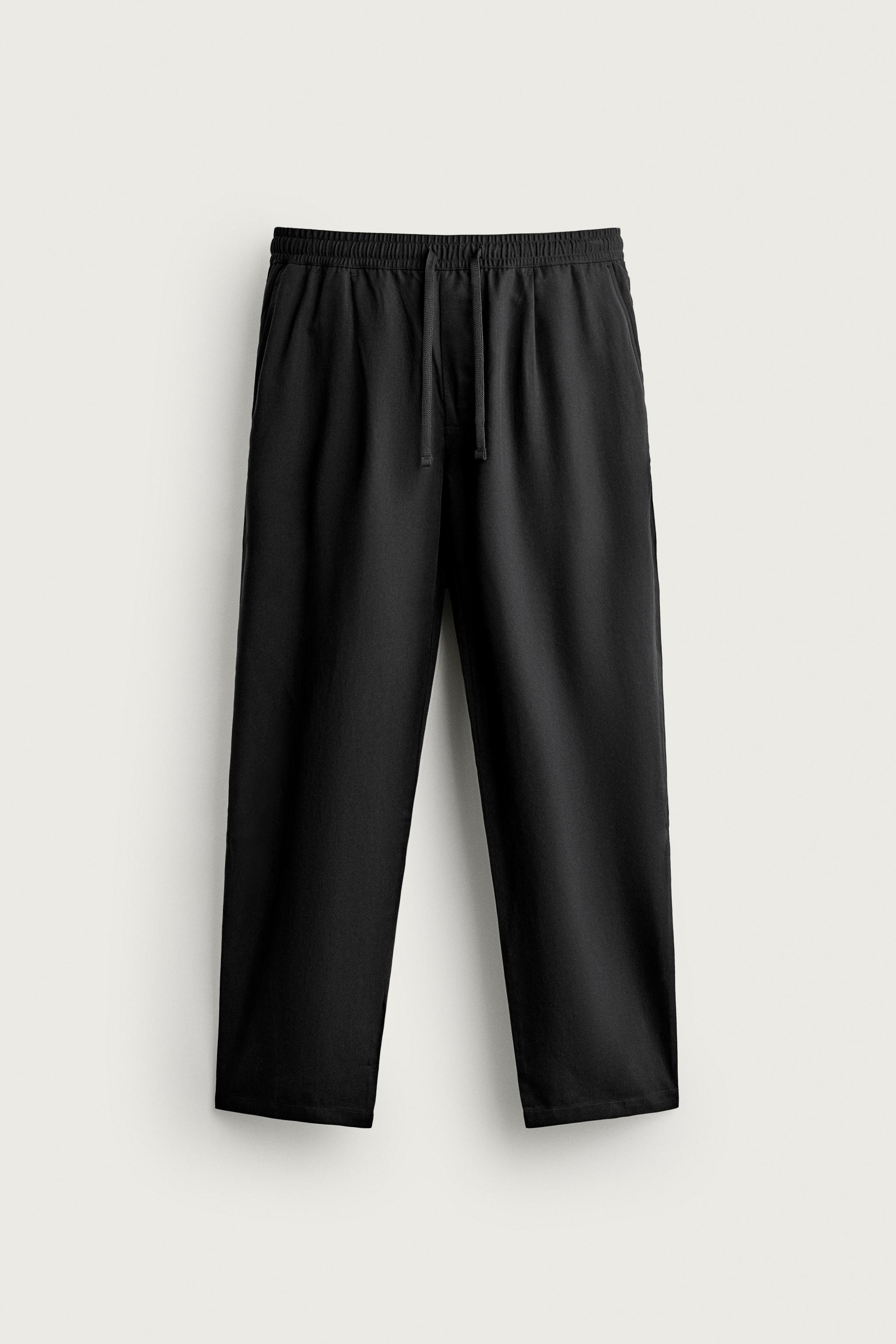 100% LYOCELL RELAXED FIT PANTS — Black