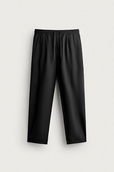 PANTALÓN RELAXED FIT 100% LYOCELL - Negro de Zara