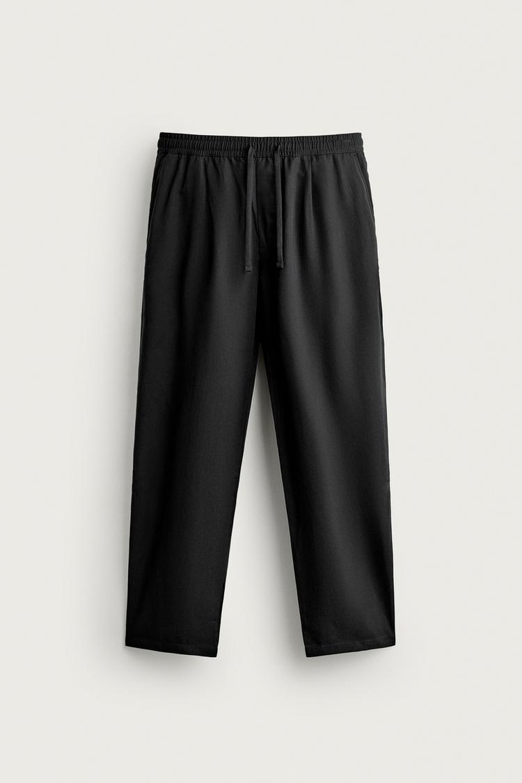 100% LYOCELL RELAXED FIT TROUSERS