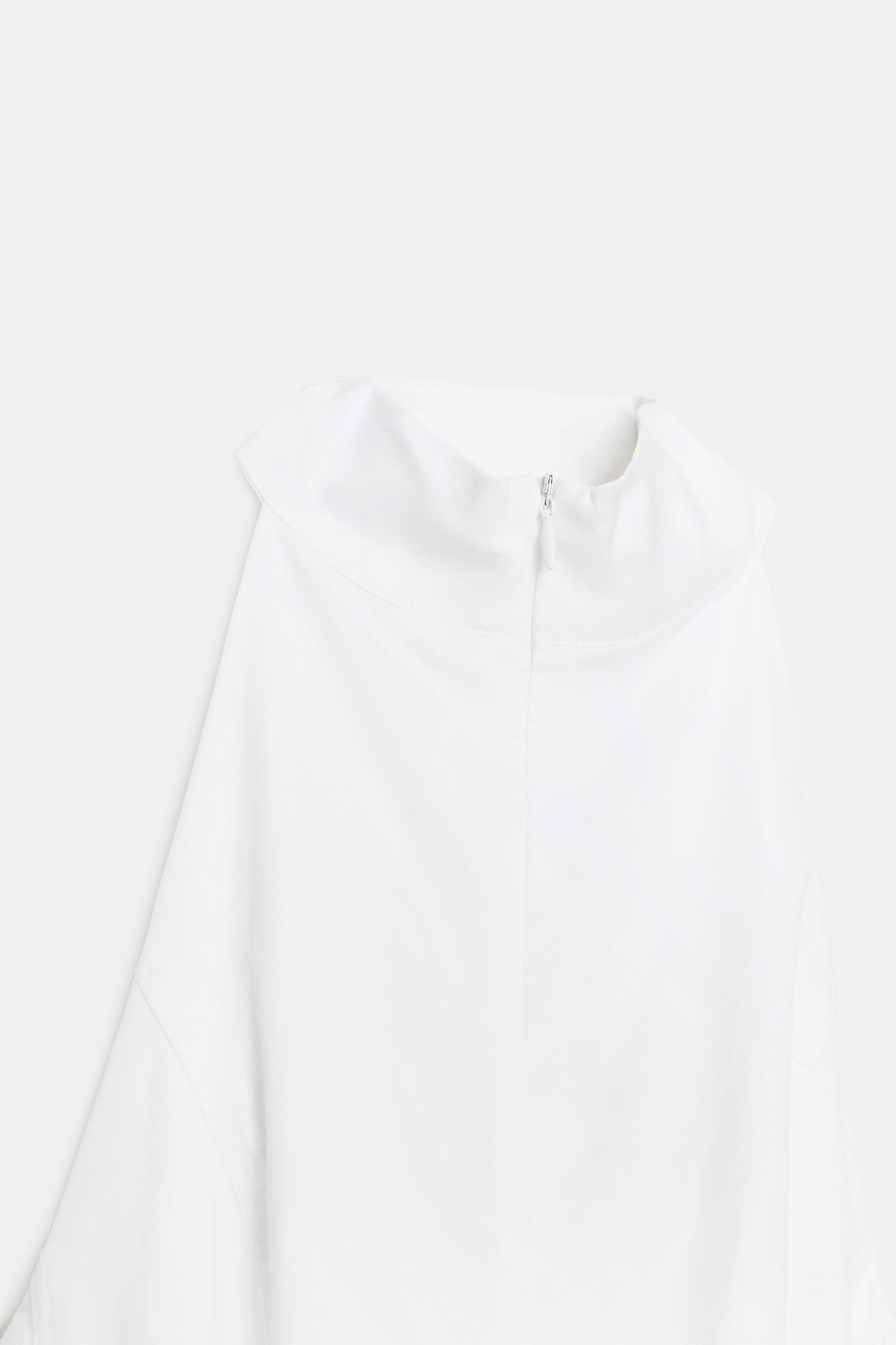 ROBE MI-LONGUE HALTER À GODETS