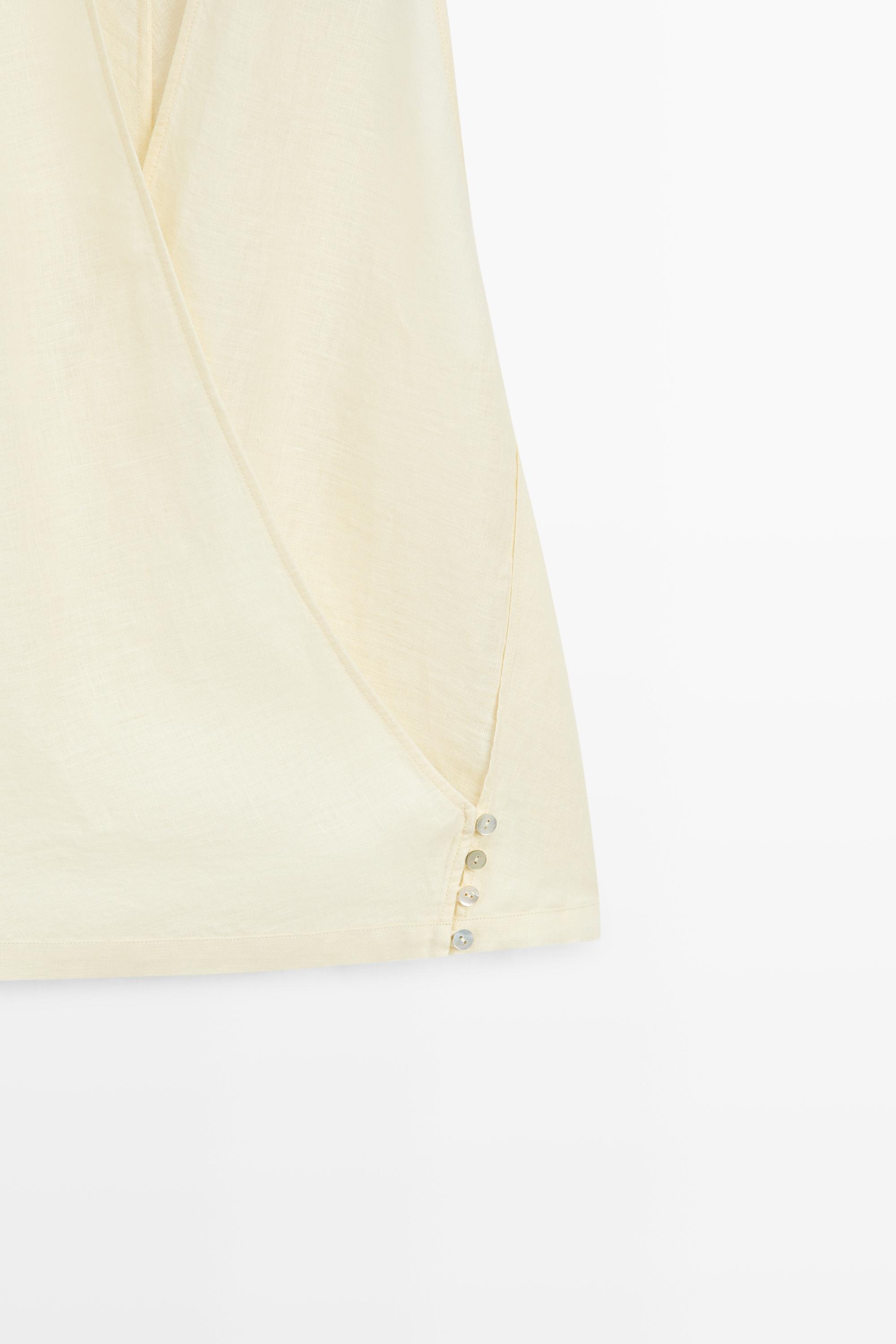 Top croisé avec détail de boutonnage 100 % lin
