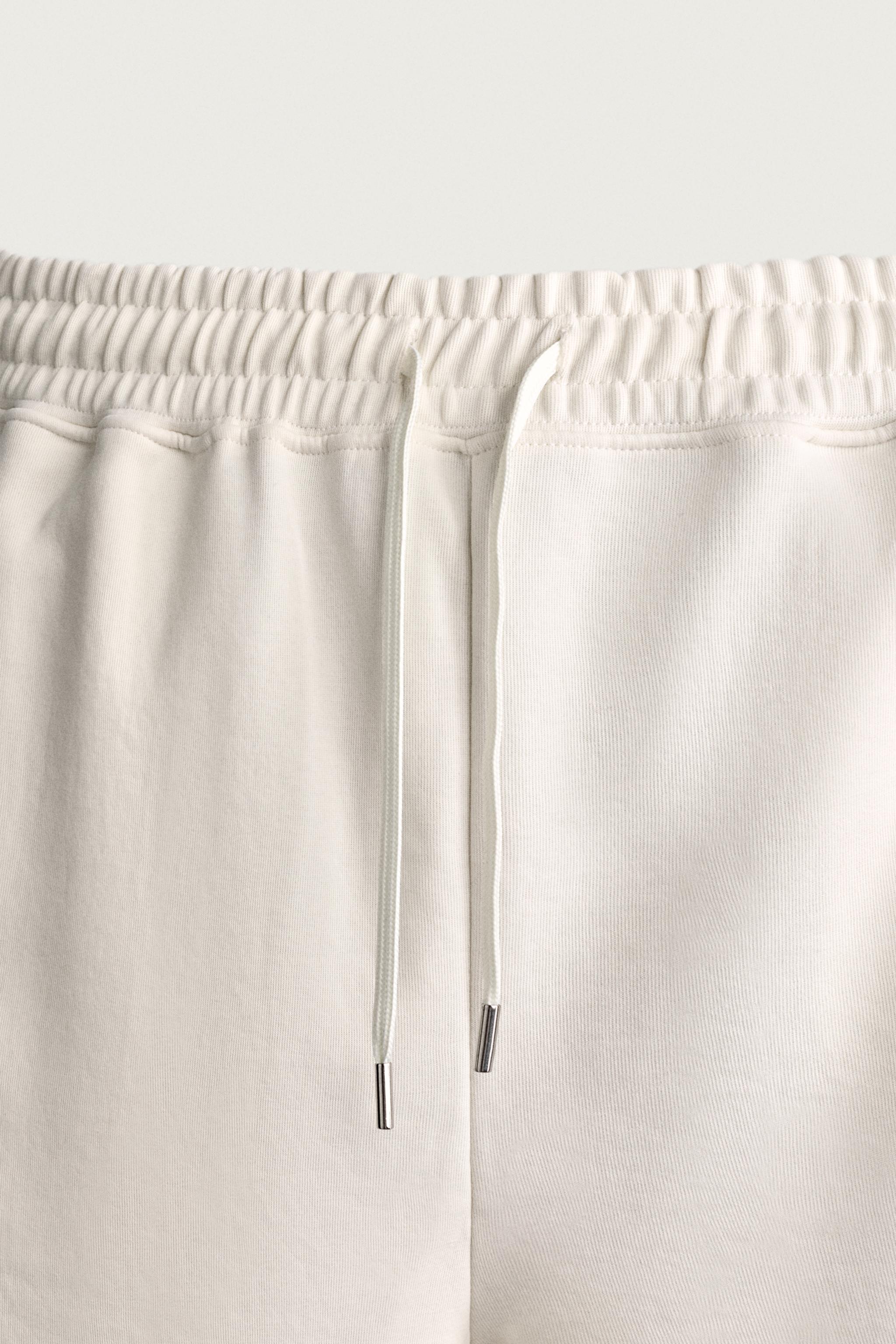 SHORT DE JOGGING RELAXED FIT INTERLOCK