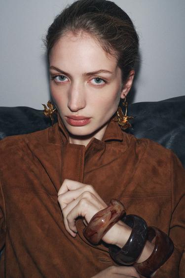 BOUCLES D'OREILLES FLEUR TEXTURÉE - Doré de Zara