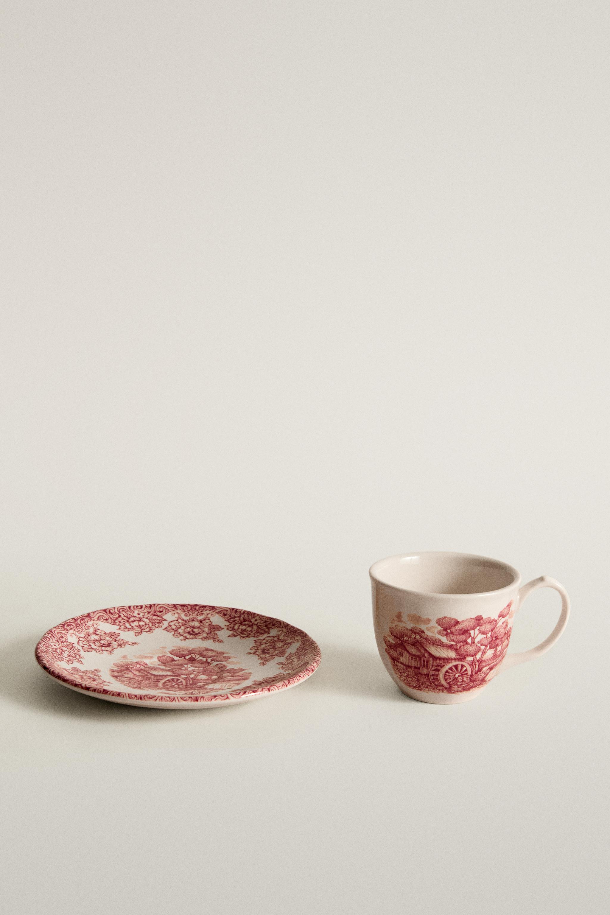 FLORAL AND LANDSCAPE EARTHENWARE COFFEE CUP AND SAUCER SET