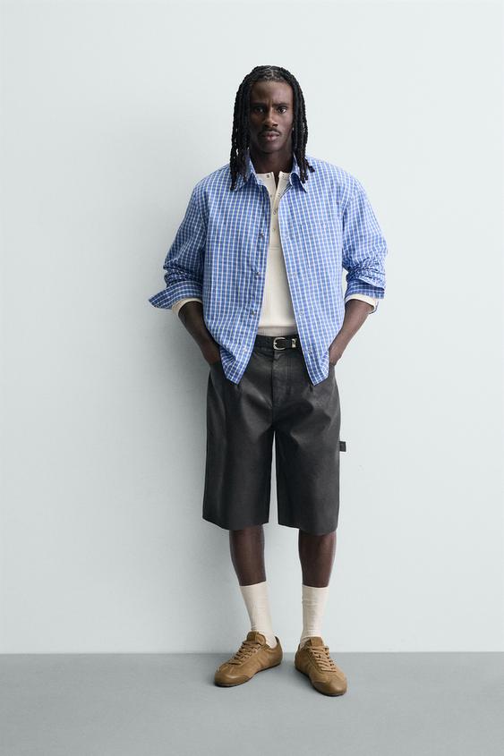 RELAXED FIT FAUX LEATHER SHORTS