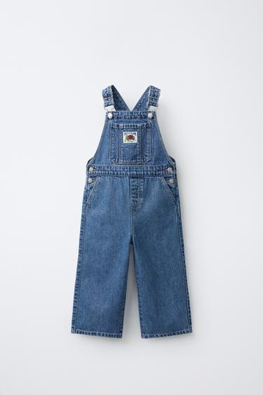 DŽINS HLAČE Z NARAMNICAMI Z OZNAKO FRUIT OF THE LOOM™ - Srednje modra od Zare