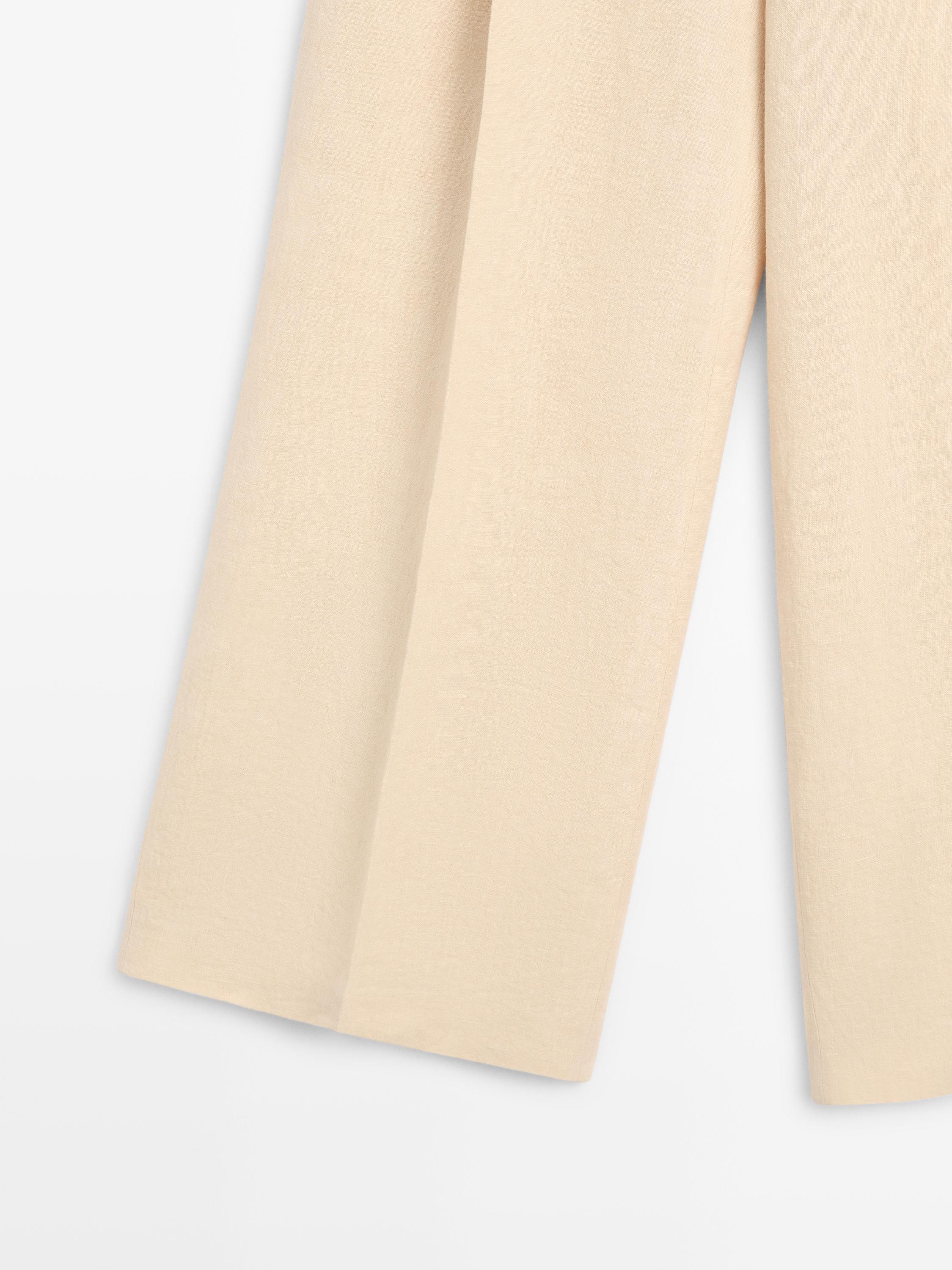 Wide-leg linen trousers with pocket detail