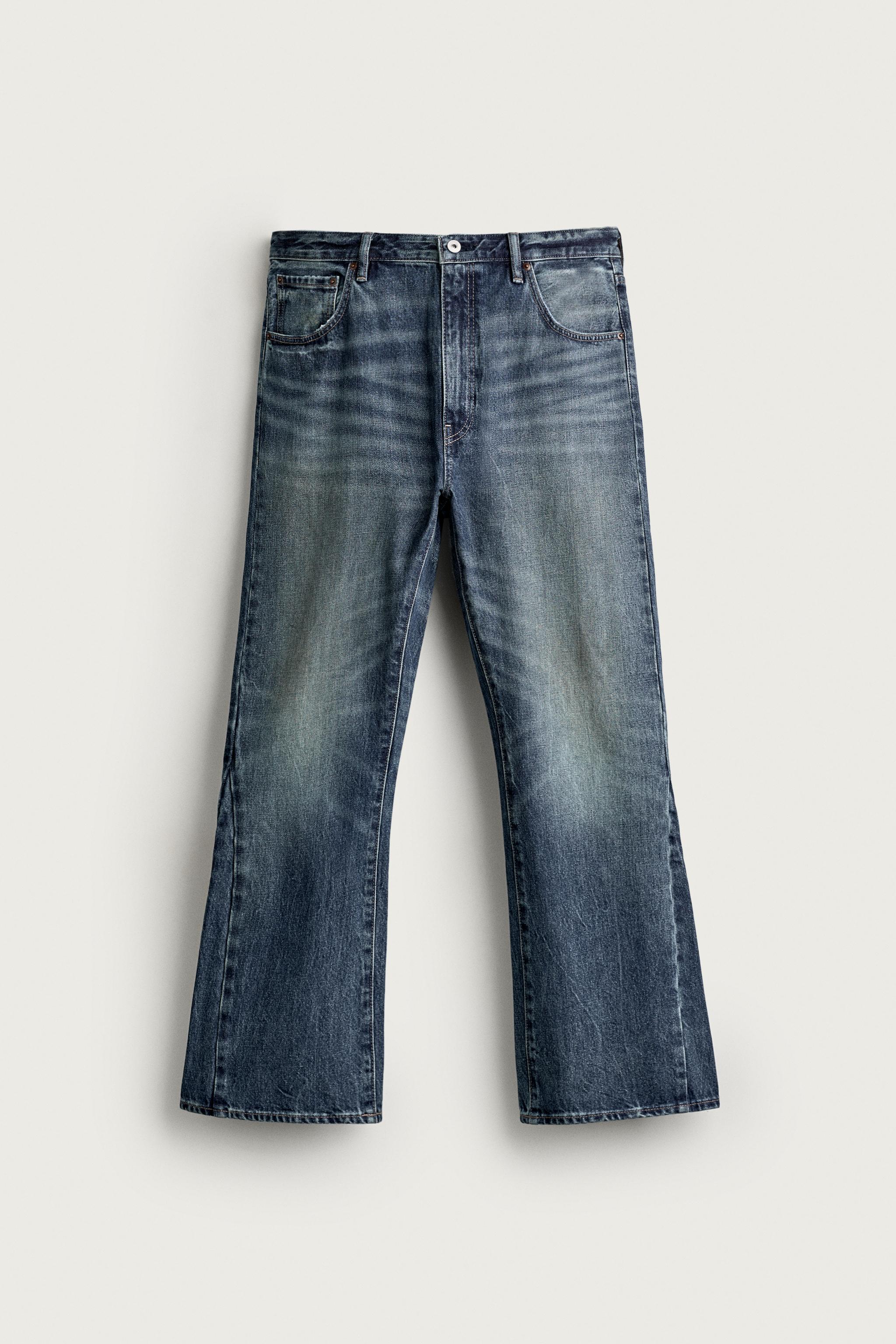 DISTRESSED FLARE FIT JEANS — Mid-blue