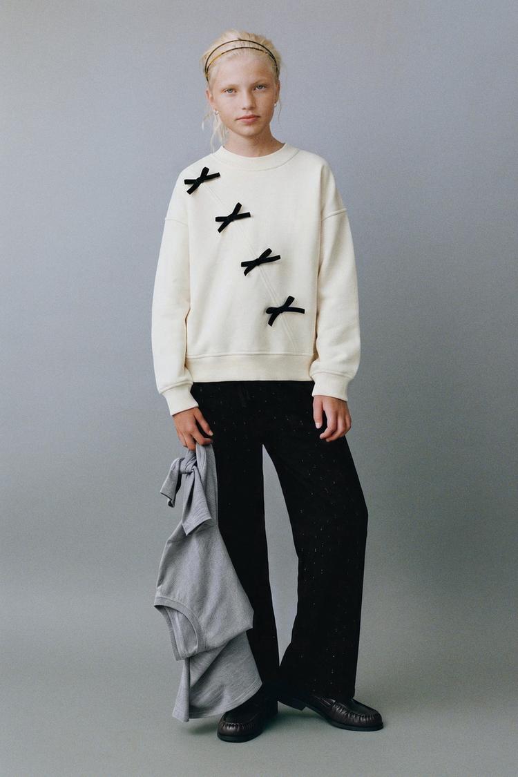 Sudadera lazos flock