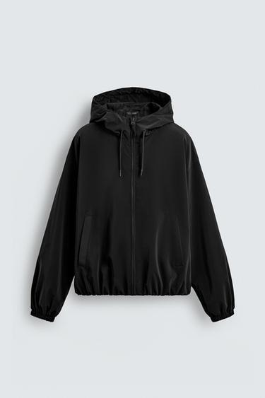CAZADORA TÉCNICA CAPUCHA - Negro de Zara