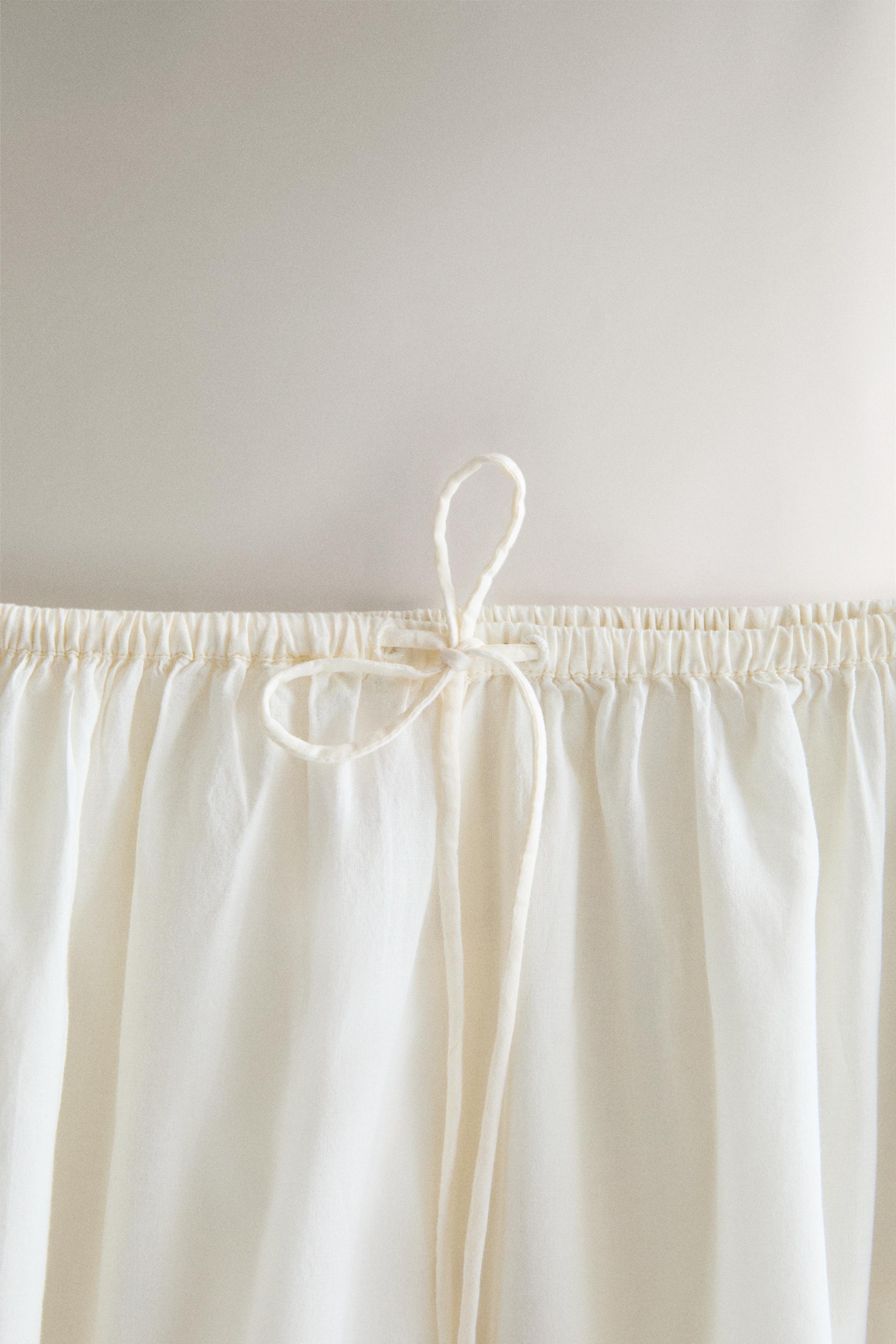 SMOCKED TROUSERS WITH LACE AND DRAWSTRINGS — Ivory