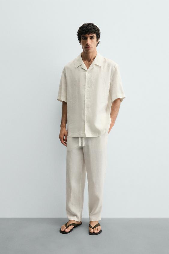 PANTALÓN RELAXED FIT 100% LINO - Blanco de Zara - Imagen 0