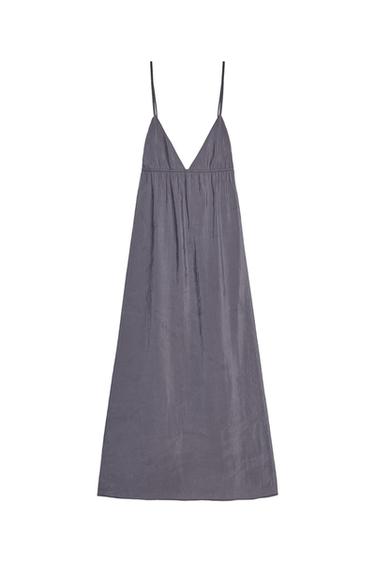 Front view of a sleeveless gray dress with spaghetti straps and a V-neck.