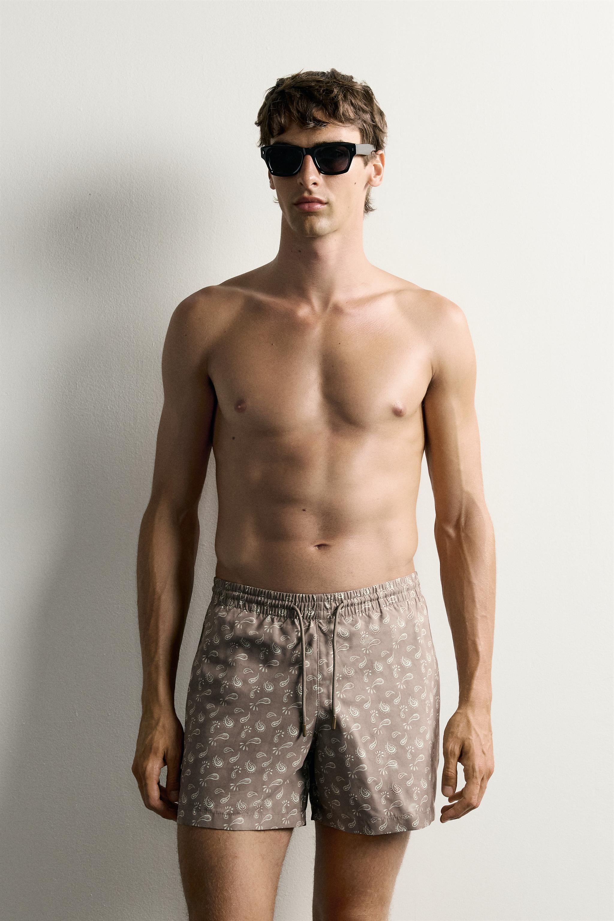 PAISLEY PRINT MID-LENGTH SWIM TRUNKS