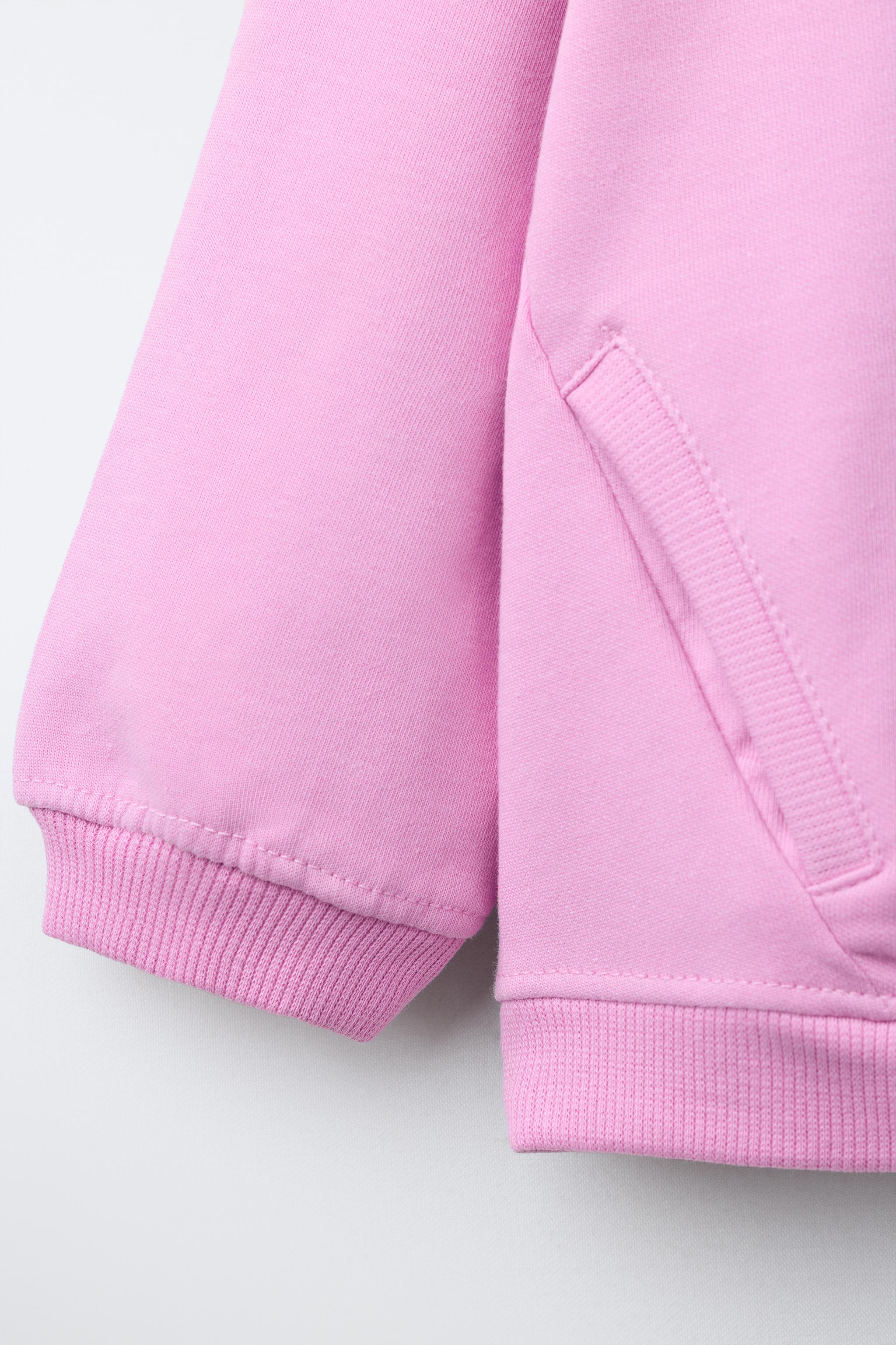 INTERLOCK ZIP SWEATSHIRT WITH RAISED TEXT