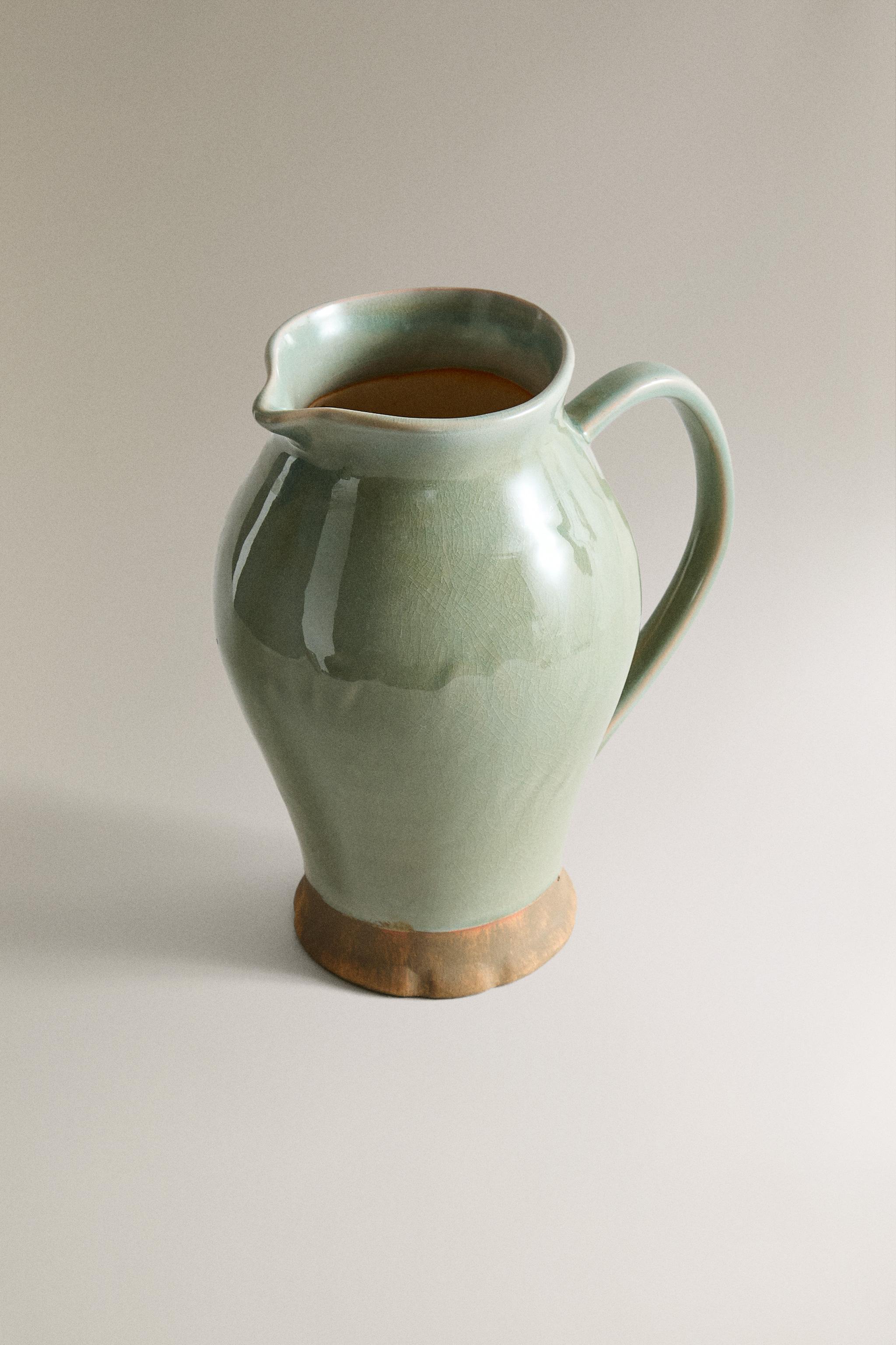 GREENISH CERAMIC VASE