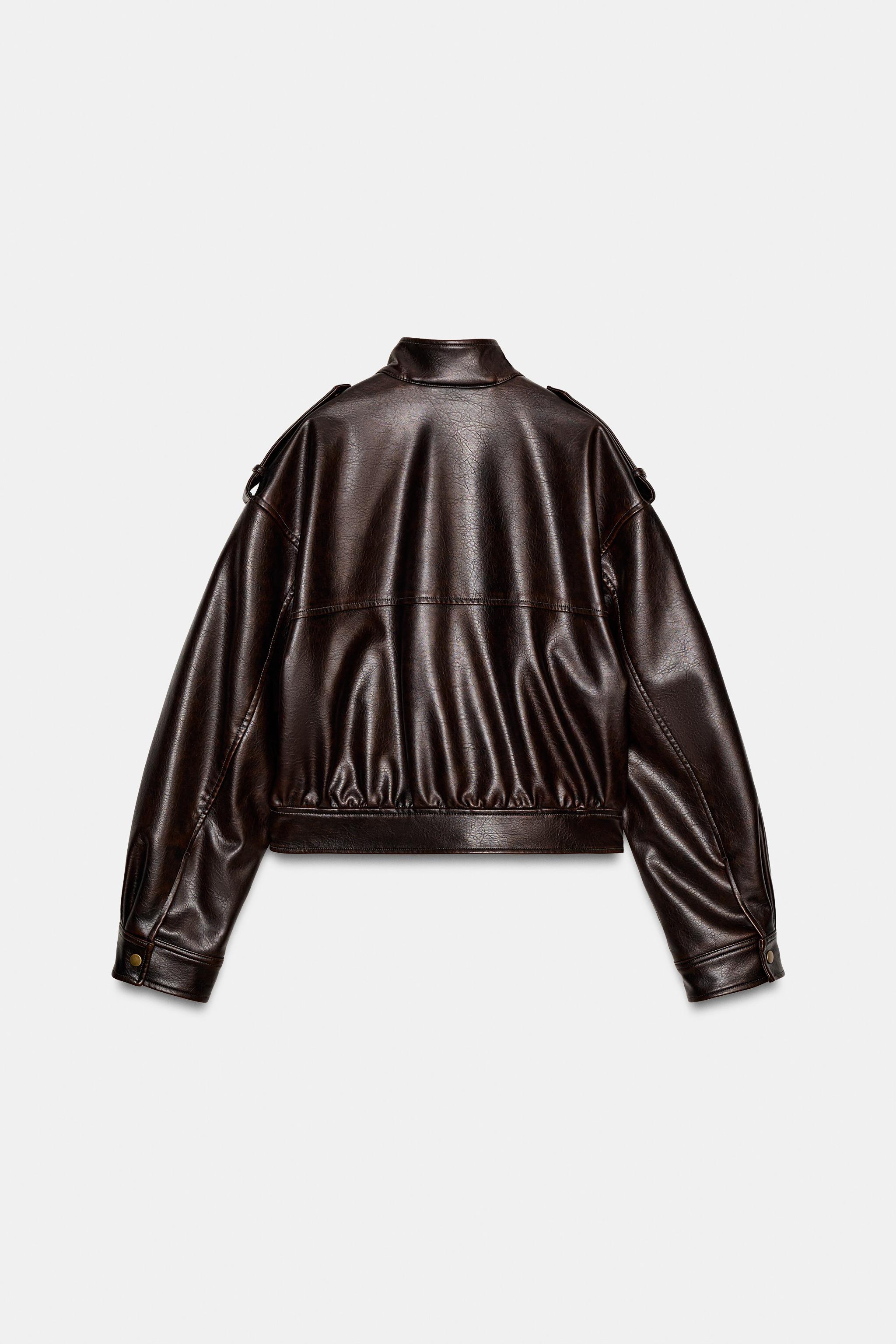 BLOUSON EN MATIÈRE SYNTHÈTIQUE AVEC PATTES