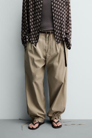 PANTALÓN BALLOON FIT PLIEGUES - Tostado de Zara