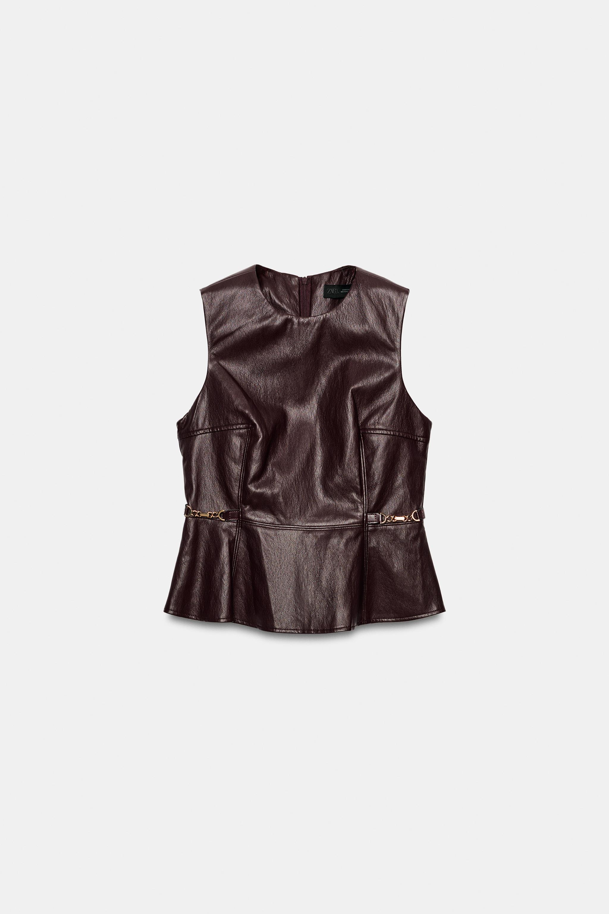 FAUX LEATHER TOP WITH GOLD-TONE APPLIQUÉS