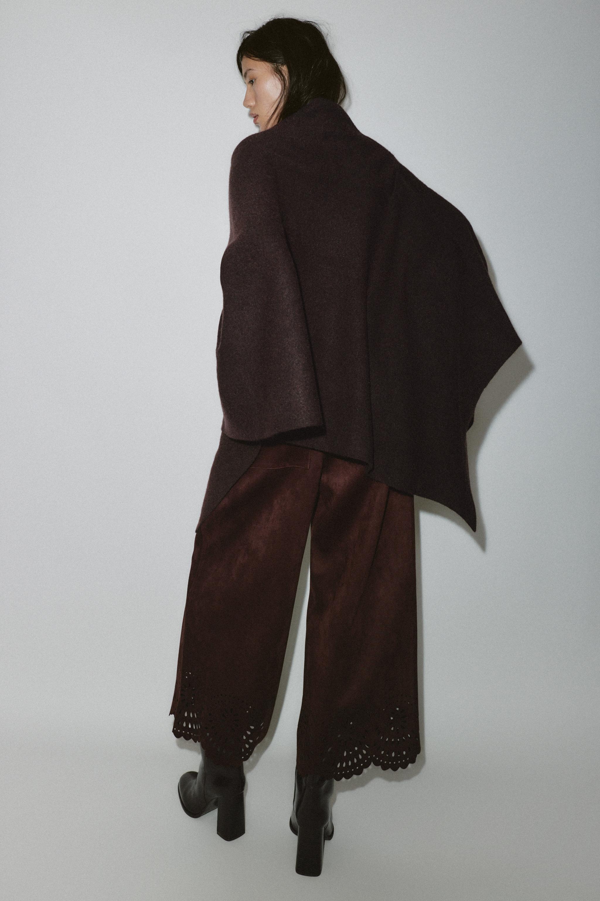 HIGH COLLAR KNIT CAPE