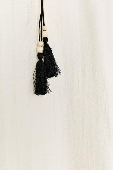 BLOUSE À VOLUME ET VOLANTS - Écru / Noir de Zara - Image 8