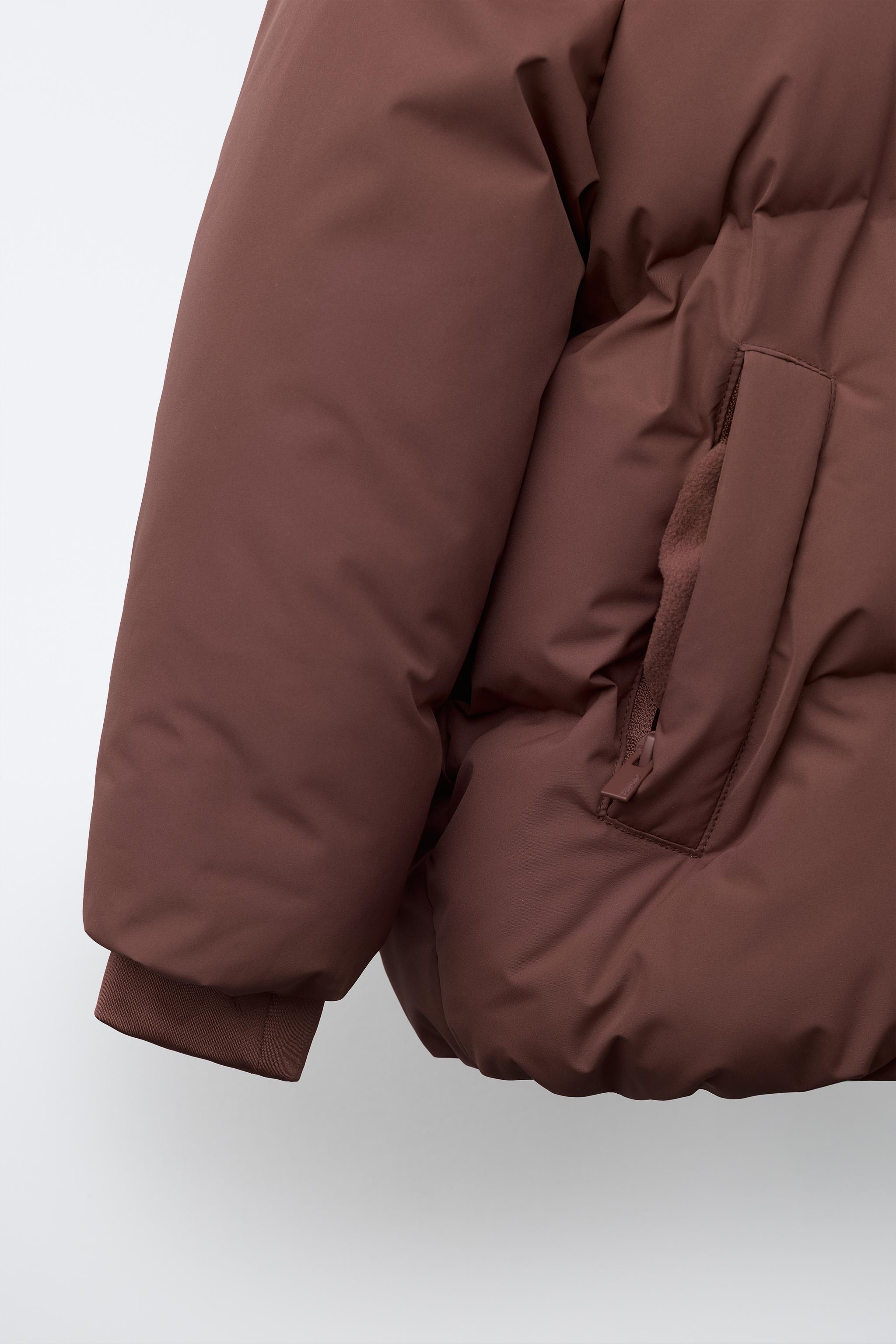 MANTEAU MATELASSÉ À CAPUCHE DÉPERLANT
