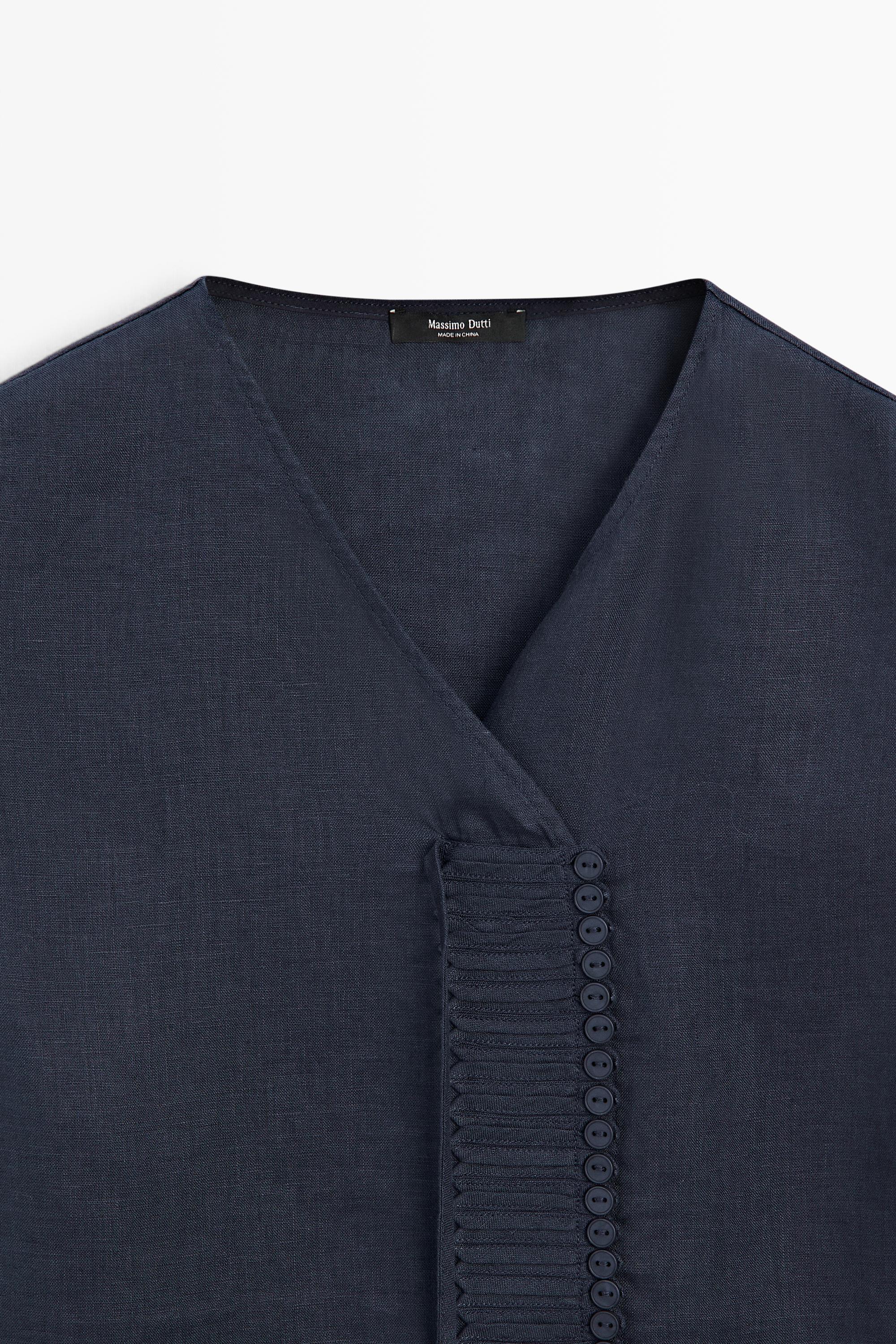 100% linen crossover top with button detail