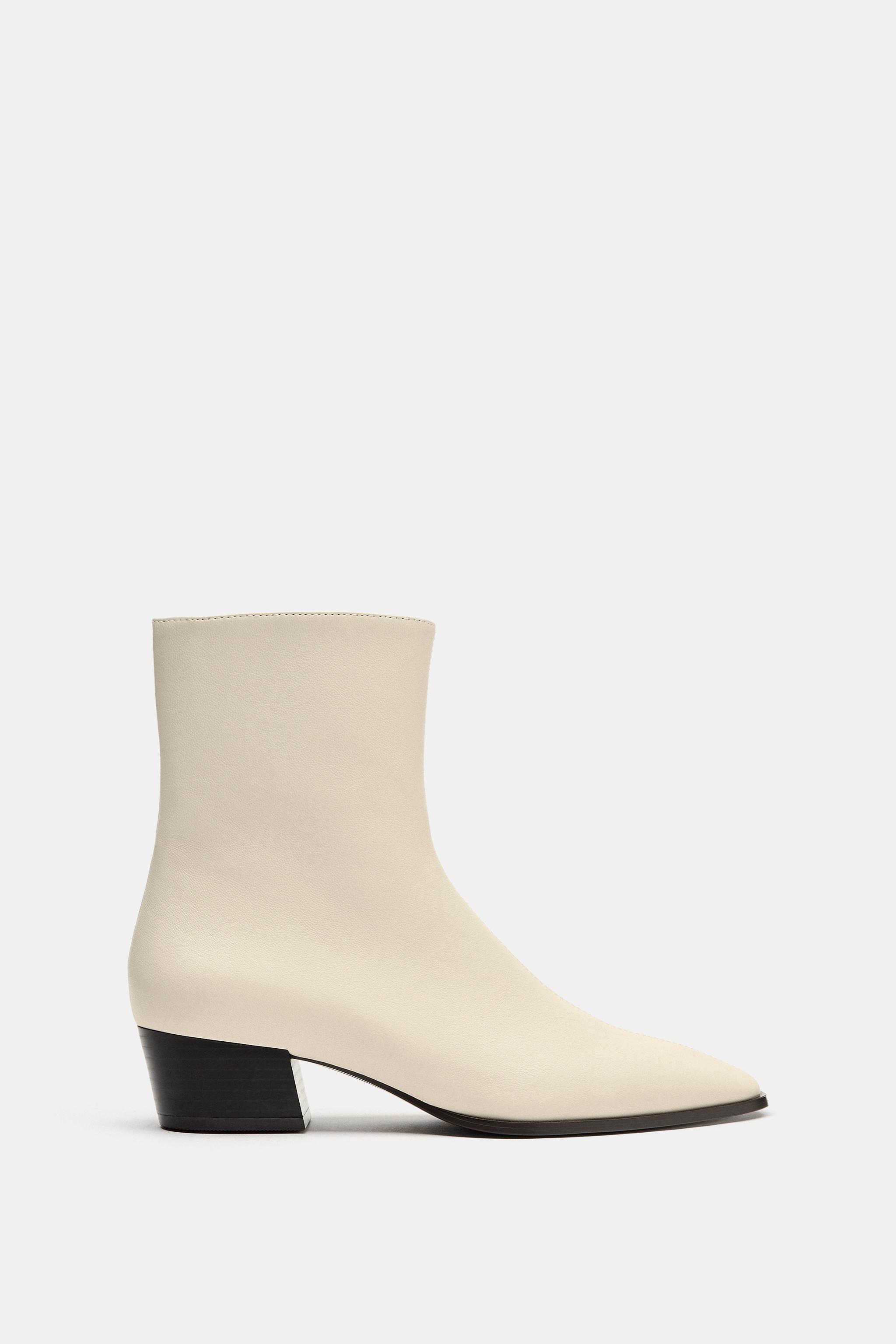 BOTTINES À TALONS EN CUIR