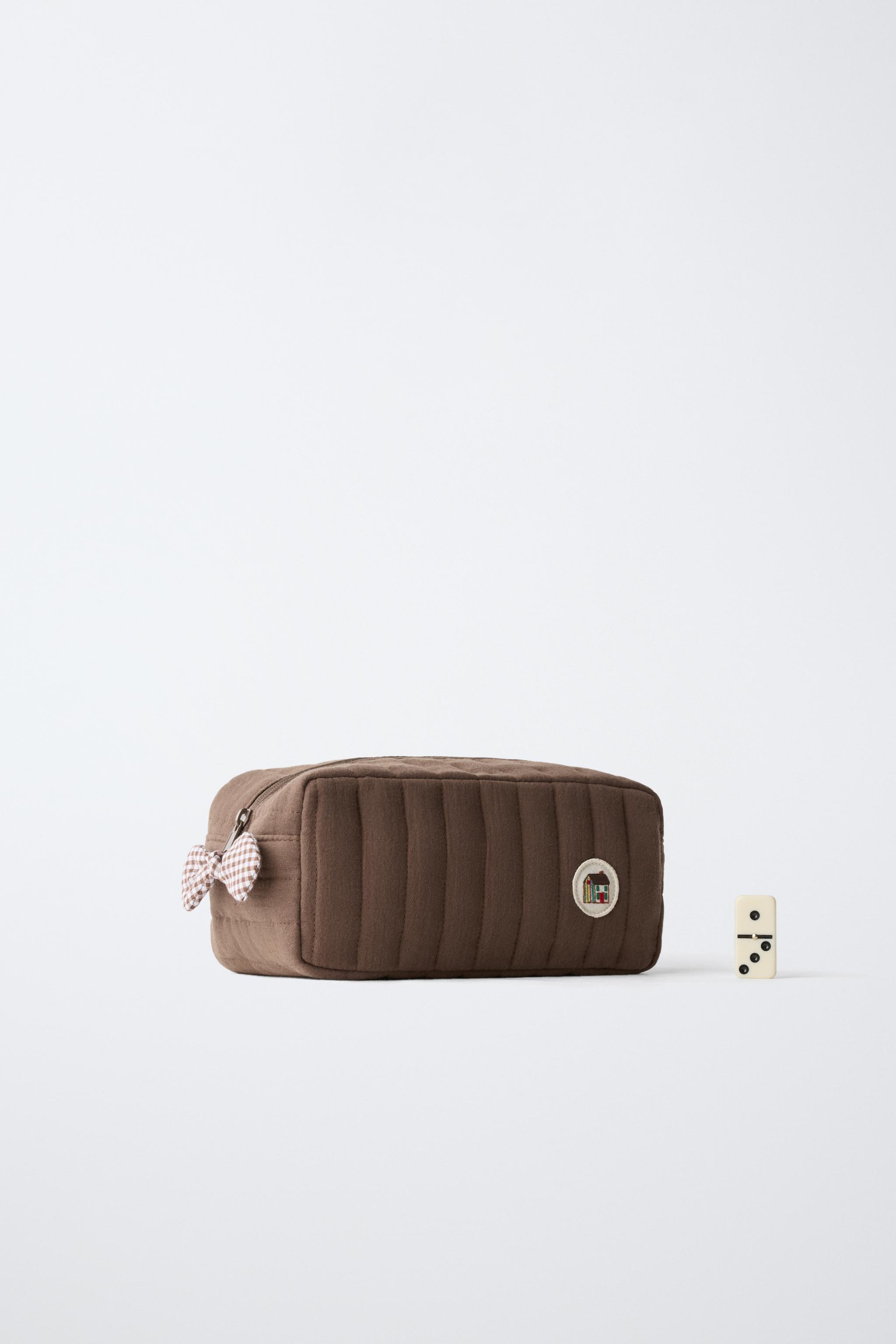 TROUSSE MATELASSÉE