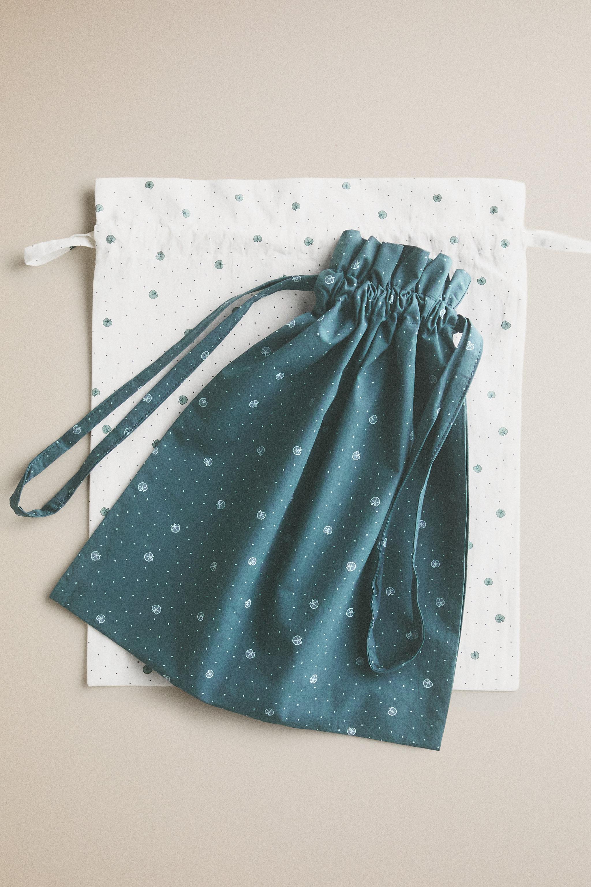 KIDS' COTTON LEAF CLOTHING BAG — Ecru
