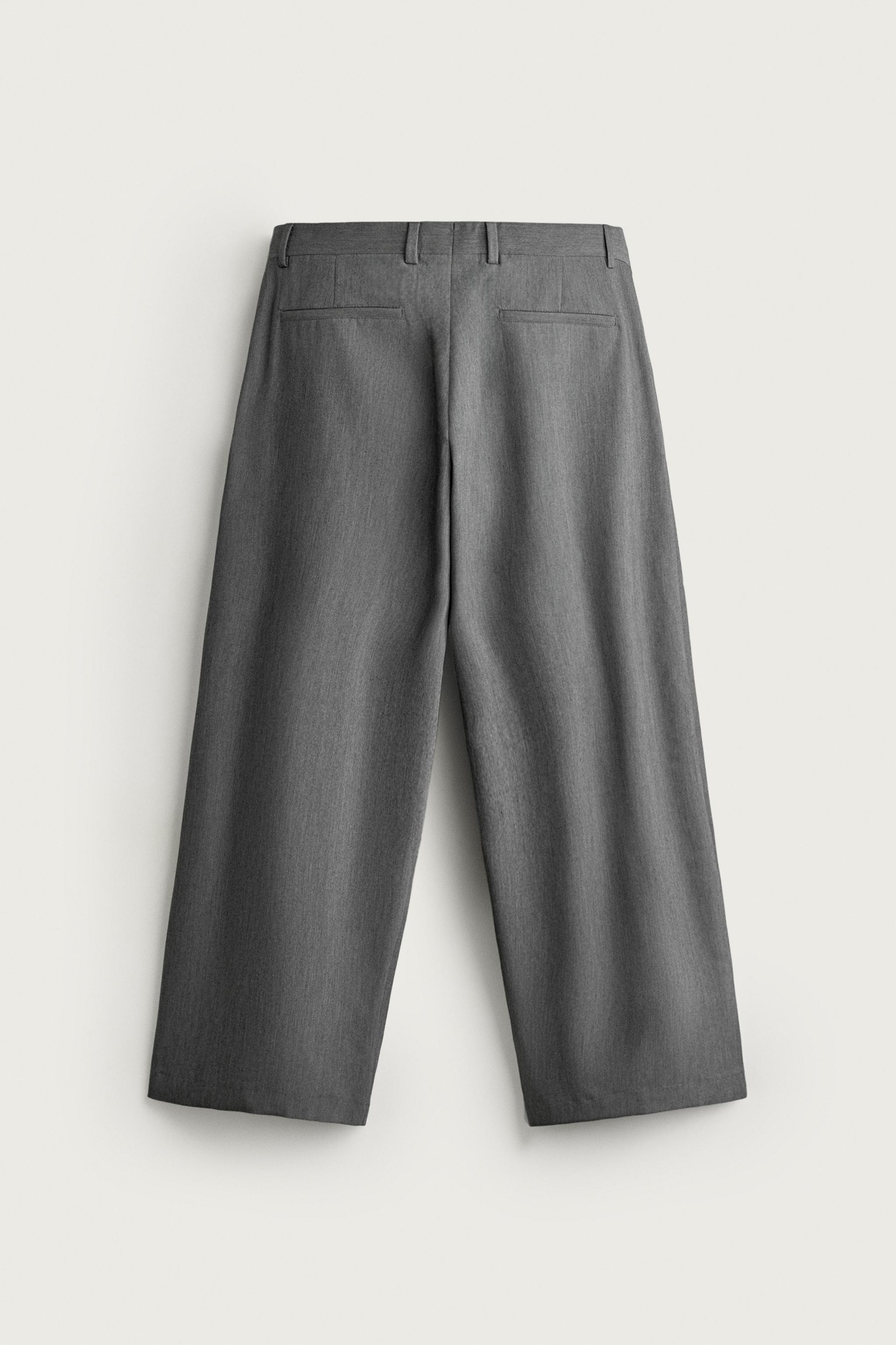 PANTALON COUPE LARGE À PLIS