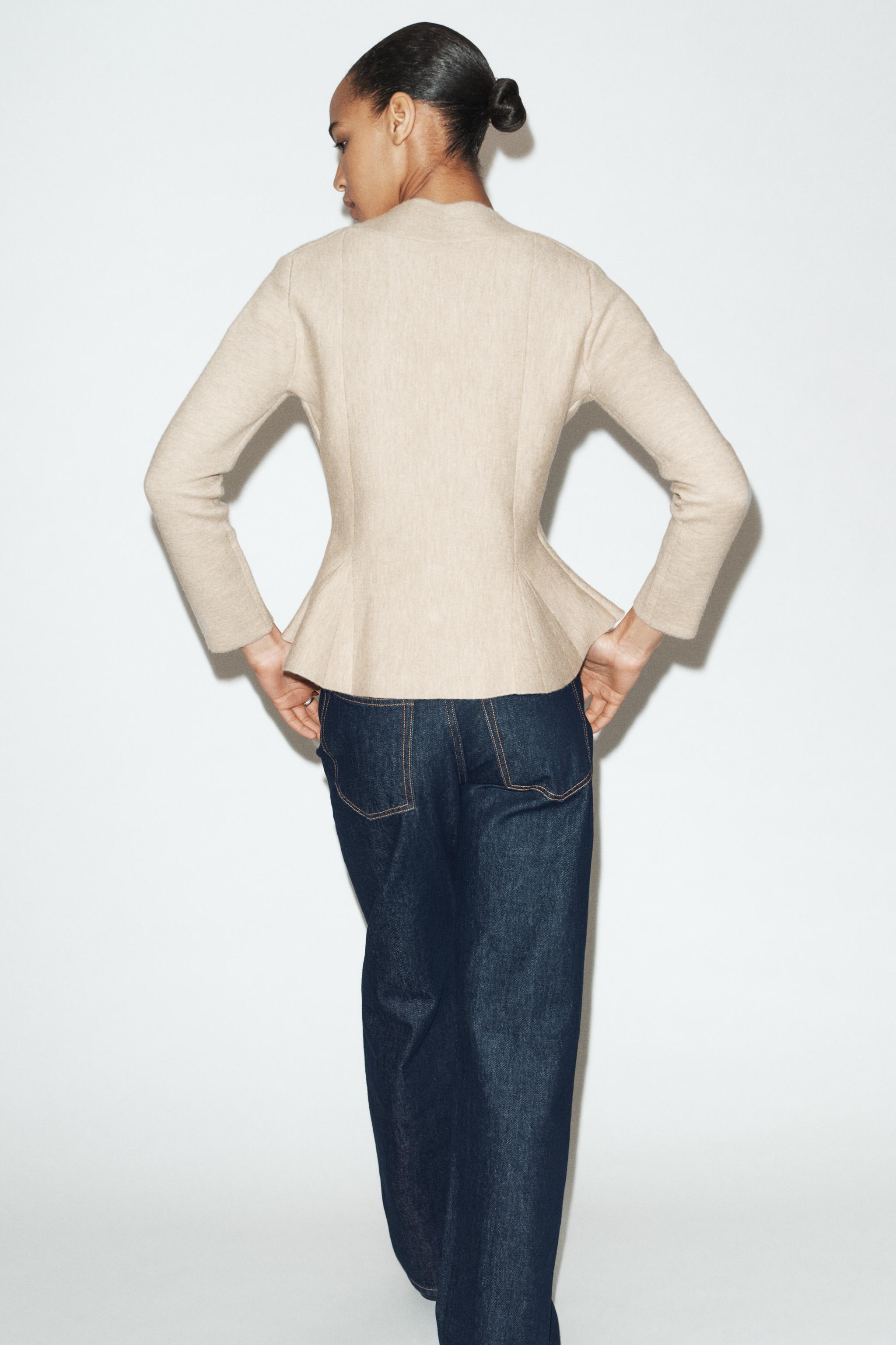 GILET EN MAILLE PEPLUM
